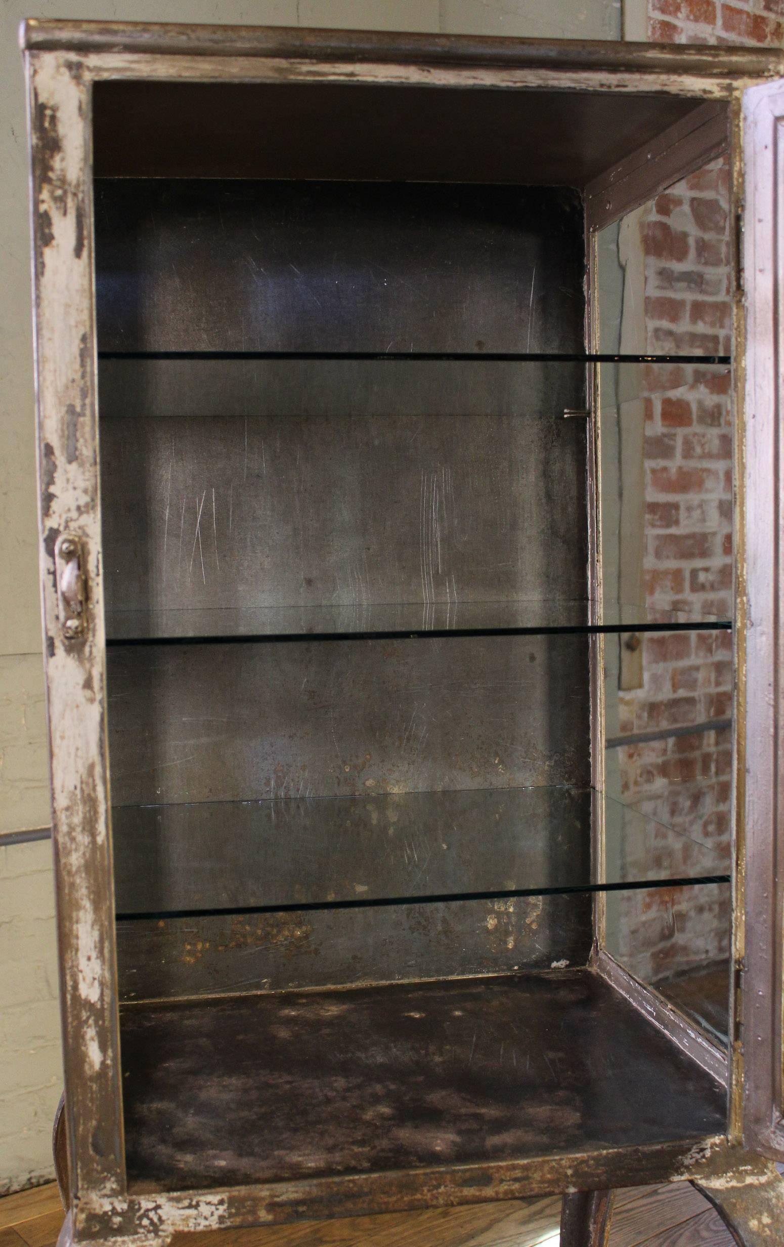 Antique Medical Cabinet with Cabriole Legs, Steel and Glass Apothecary In Distressed Condition In Oakville, CT