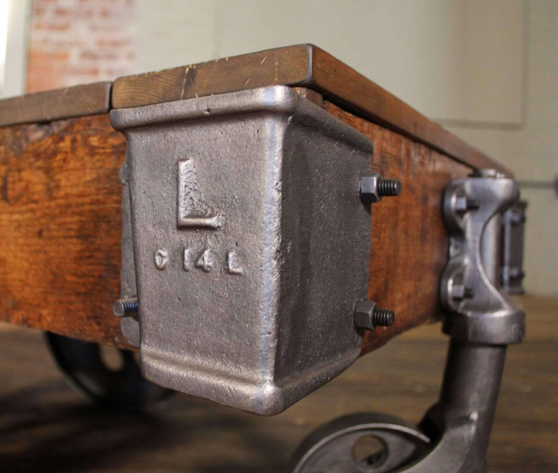 Vintage Industrial Rustic Wood and Cast Iron Factory Coffee Table Rolling Cart In Distressed Condition In Oakville, CT