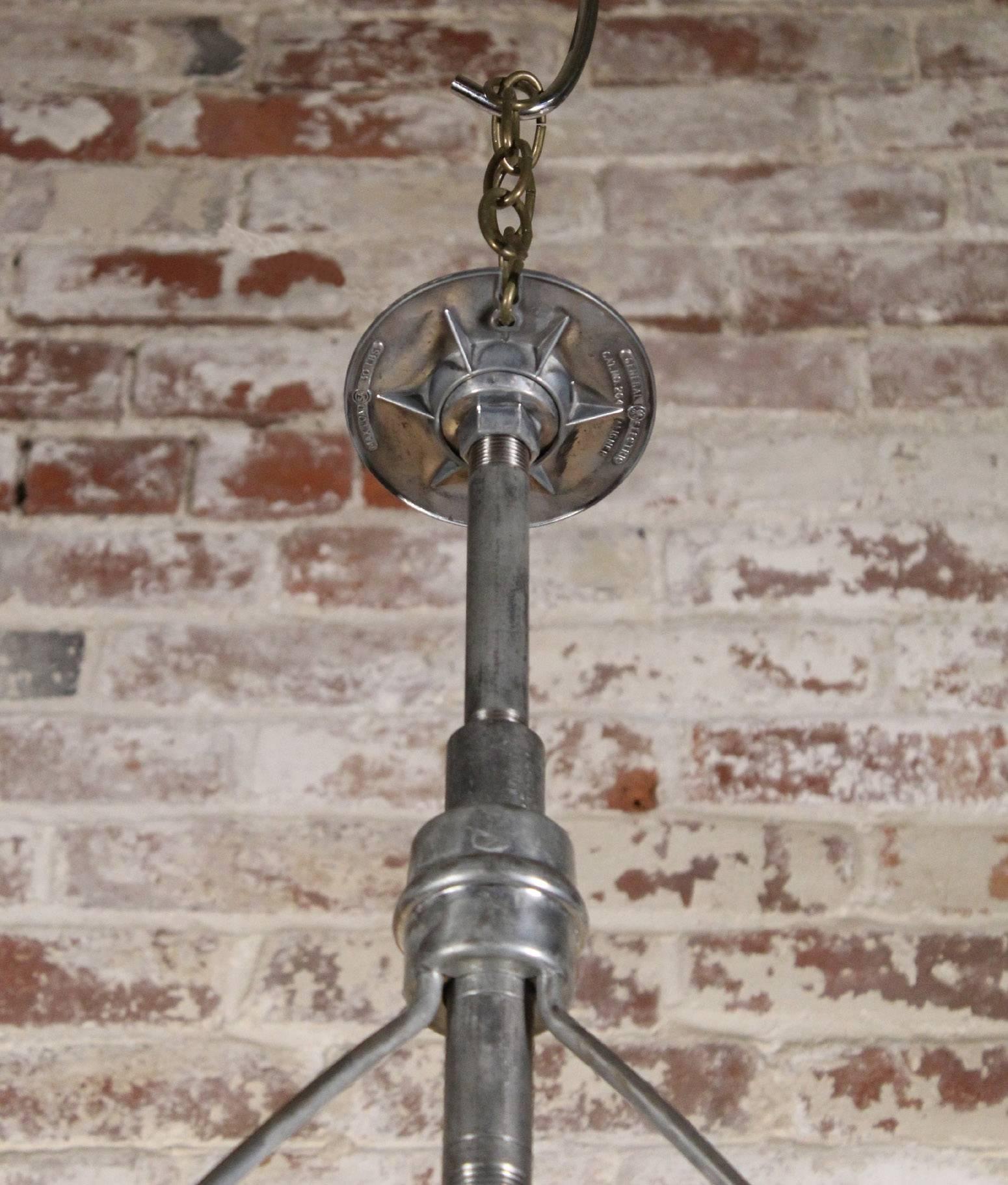 Vintage Industrial Three-Bulb Glass Holophane Pendant Hanging Light In Good Condition In Oakville, CT