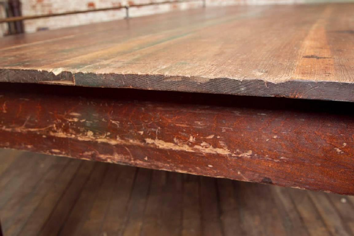 Vintage Wooden Store Display Table with Brass Rail In Distressed Condition In Oakville, CT