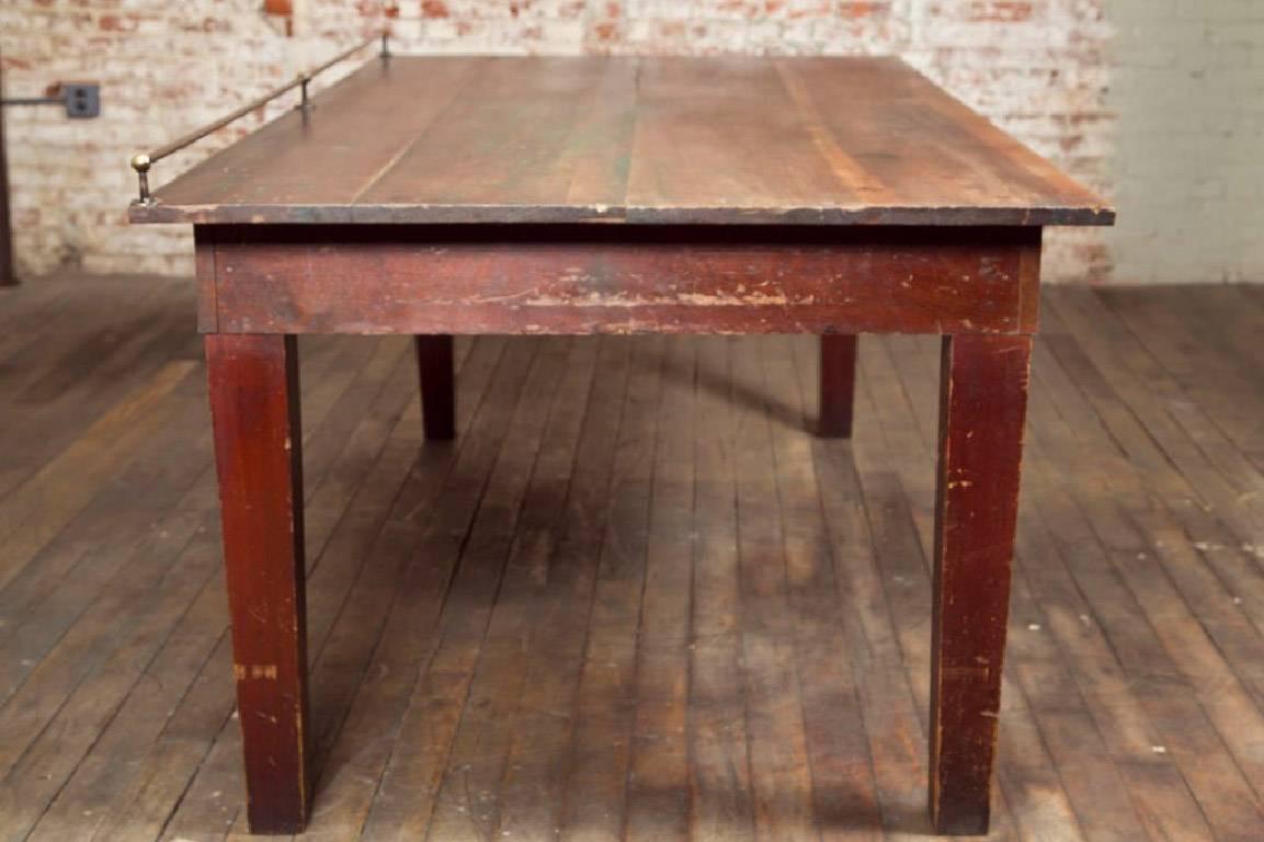 Industrial Vintage Wooden Store Display Table with Brass Rail