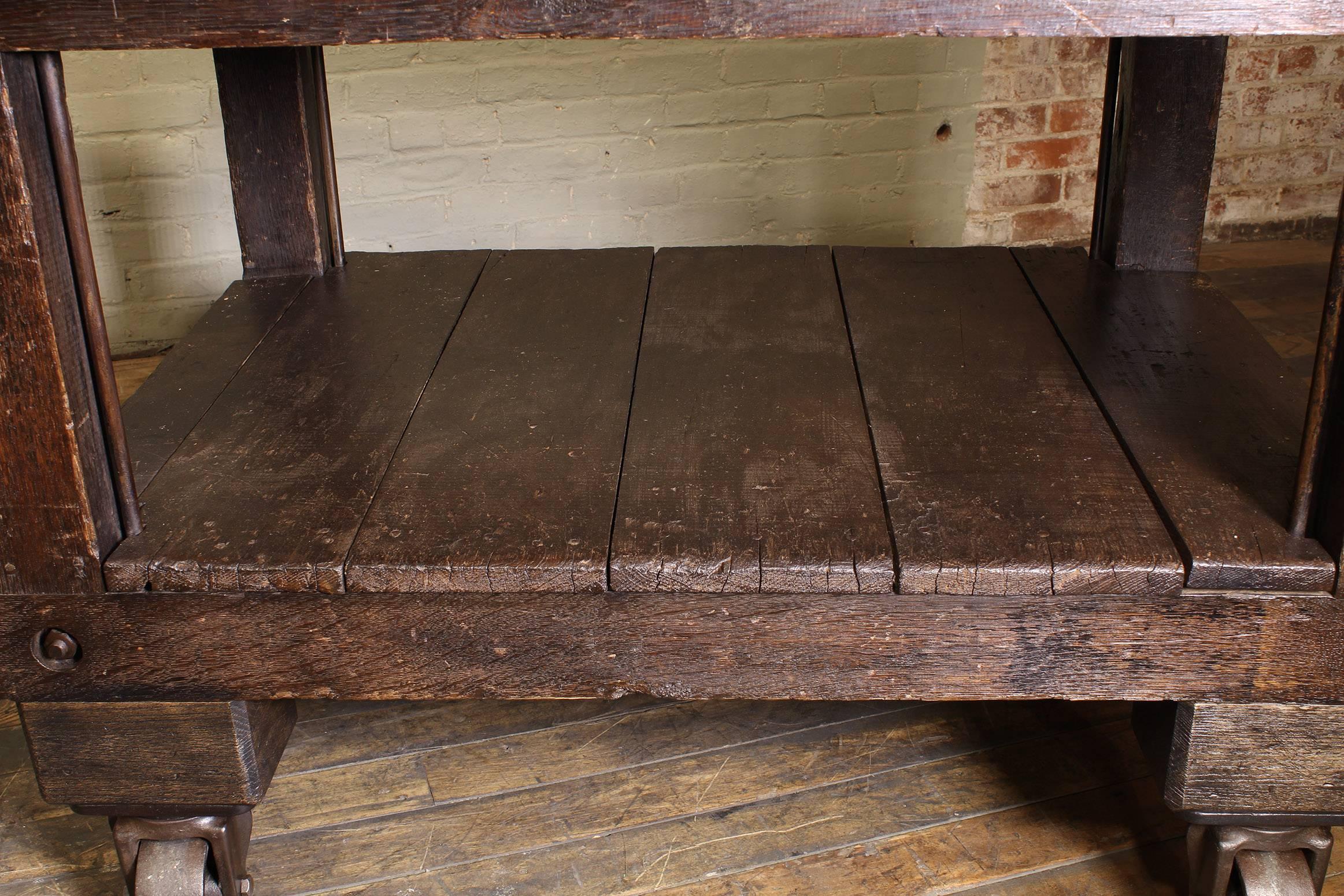 Rolling Table Kitchen Island, Wood and Cast Iron In Distressed Condition In Oakville, CT
