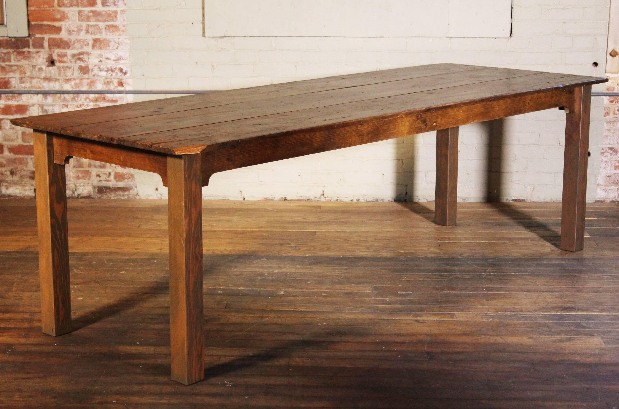 Reclaimed wood tobacco sorting farm dining harvest conference table. The pine tops were originally used as tobacco sorting tables in New England. Table measures 84