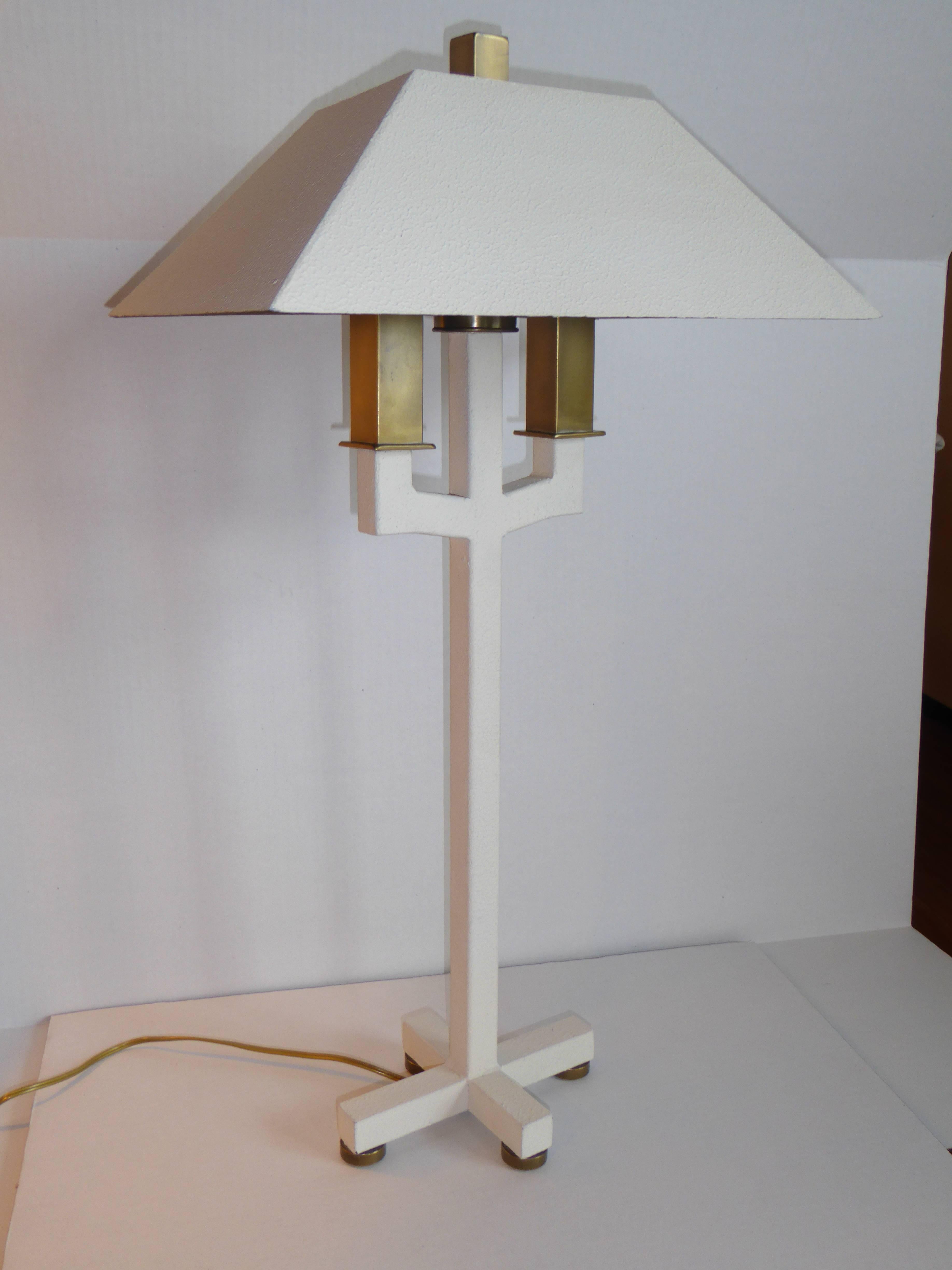 REDUCED FROM $650....Lucious antiqued brass and white textured metal Postmodern Bouillote table lamp, exceptional lighting created by Hart Associates. Featuring all metal construction with antiqued brass candles, works, finial and button feet. The