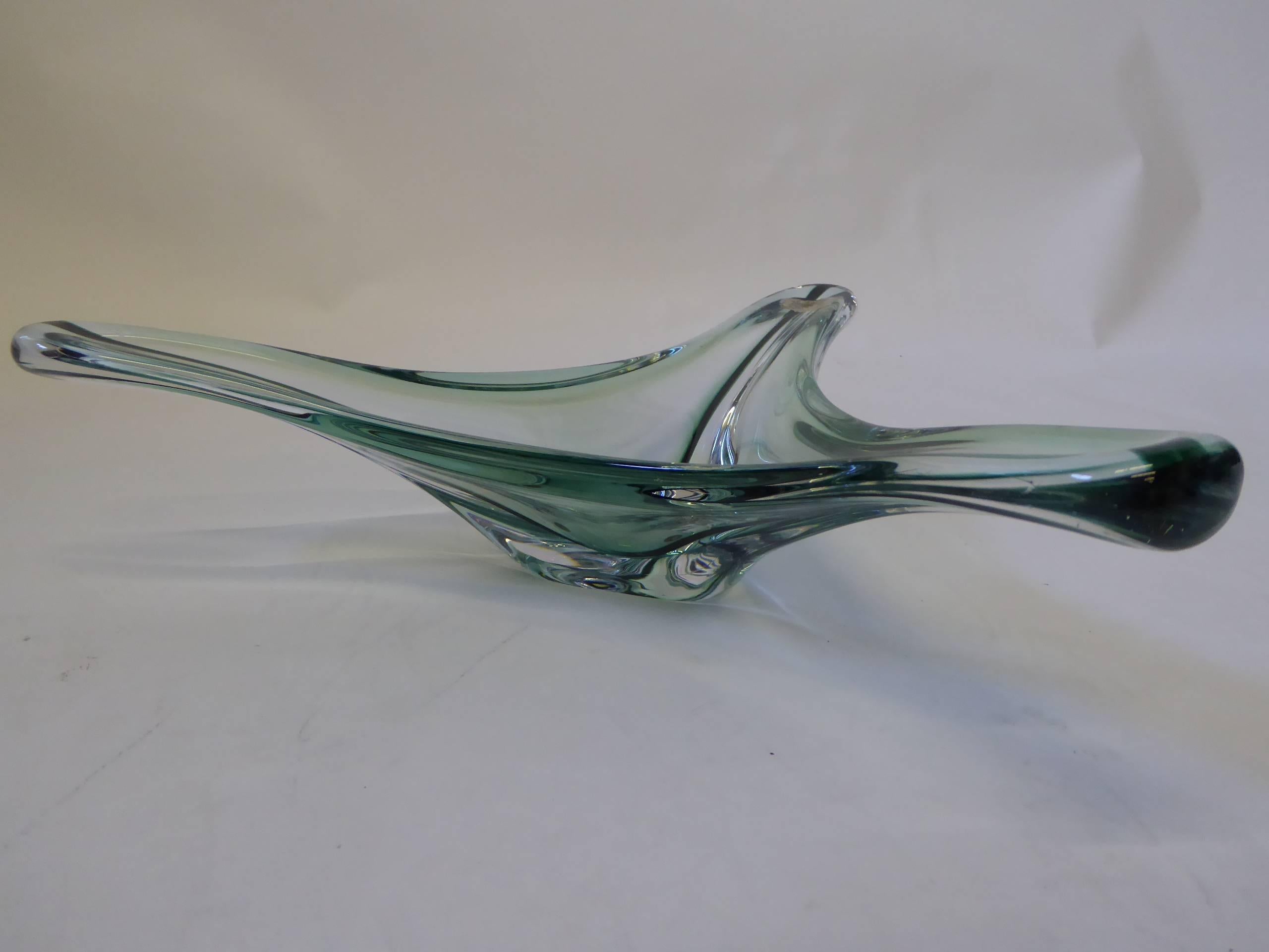 Mesmerizing, modern and surreal Mid-Century form from Val St. Lambert, Belgium's foremost glass studio. This large bowl with a radiating stylized trefoil design has an inner deep green band of color pulled to the outer arms with an overall hint of