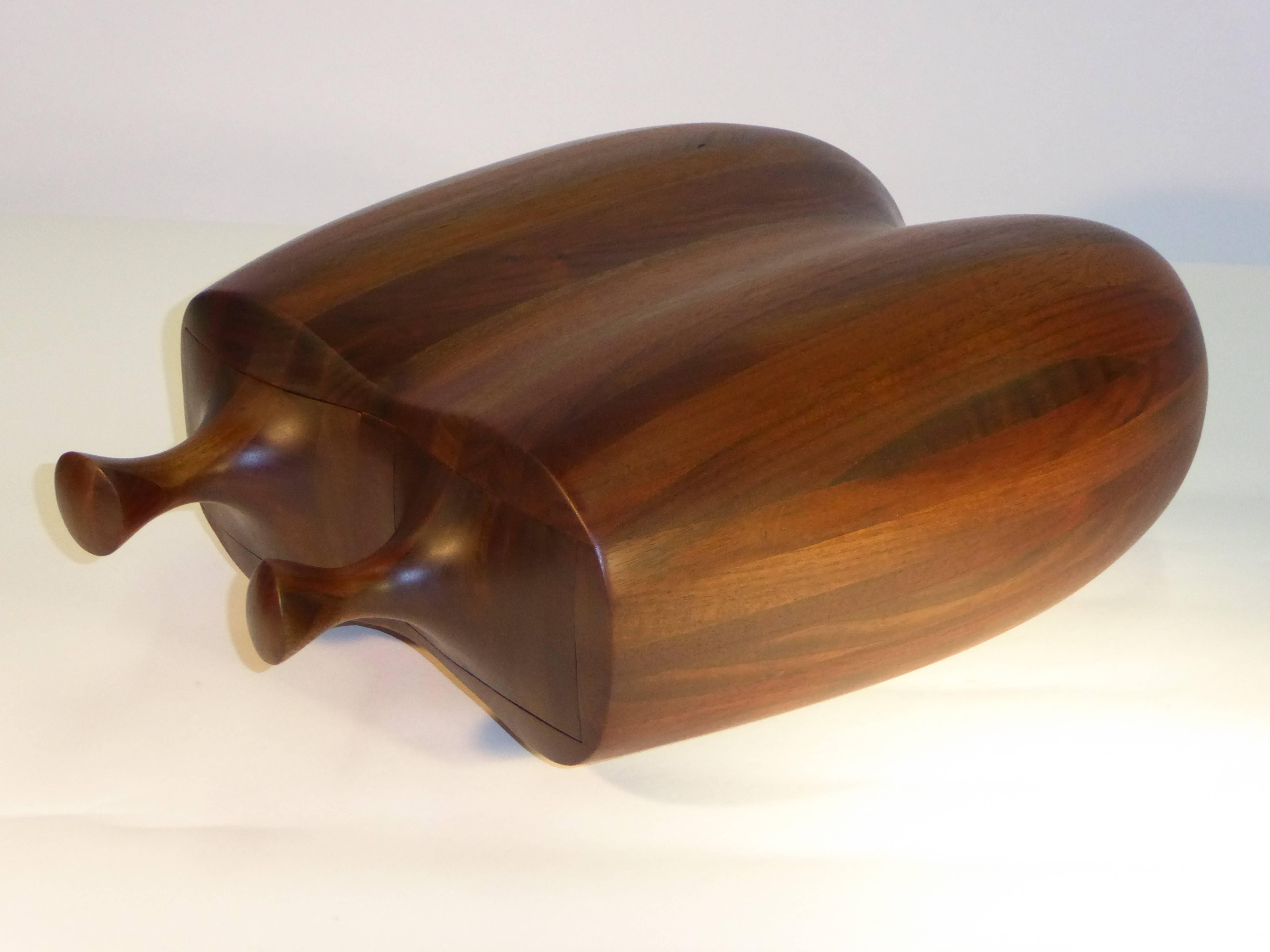 An extraordinary and large Daniel Loomis Valenza designed sinuous organic solid laminated and sculpted walnut tabletop box with two drawers. Beautifully crafted with staved figured walnut. A New Hampshire wood artisan, craftsman and professor,
