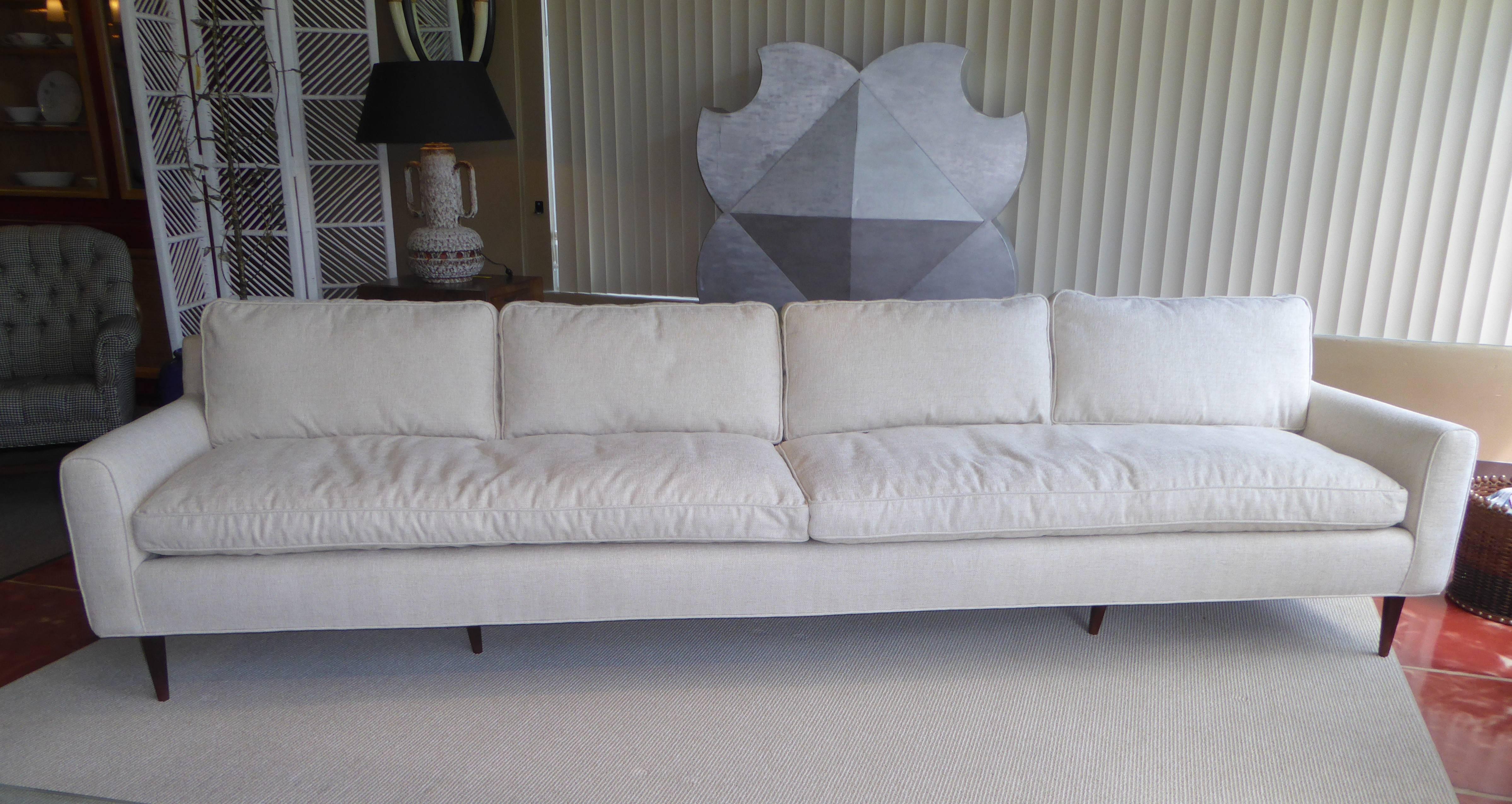 Extraordinary 1957 bespoke order from Singer & Sons for a Miami Beach residence, this Gio Ponti sofa has a great footprint and makes a refined impression with its elegant styling, down cushions and chenille weave upholstery in oatmeal white.