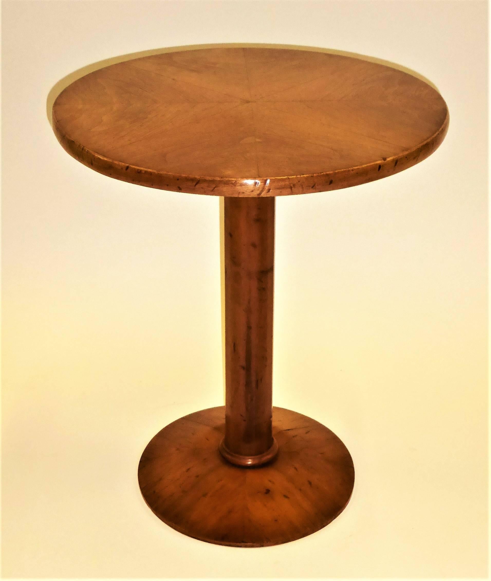 Made in Italy expressly for Bloomingdales, this late 1940s walnut occasional table in the style of Osvaldo Borsani is exquisitely made with a bookmatched quartered top, beautifully rendered and handcrafted. With a brass tag underneath, expressly