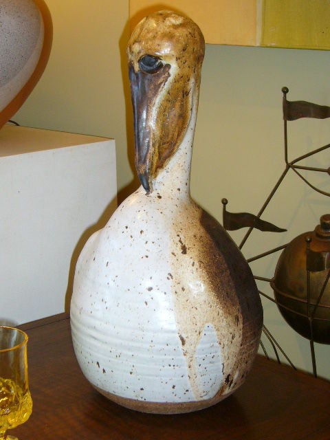 Large and strangely realistic Studio Pottery Pelican by Thomas Reece. Glazed in naturalistic browns and oxides with glaze overlays, drips and spots. Signed in the clay. Pelican at rest with curved head. Beautiful, large, stunning. Have your own