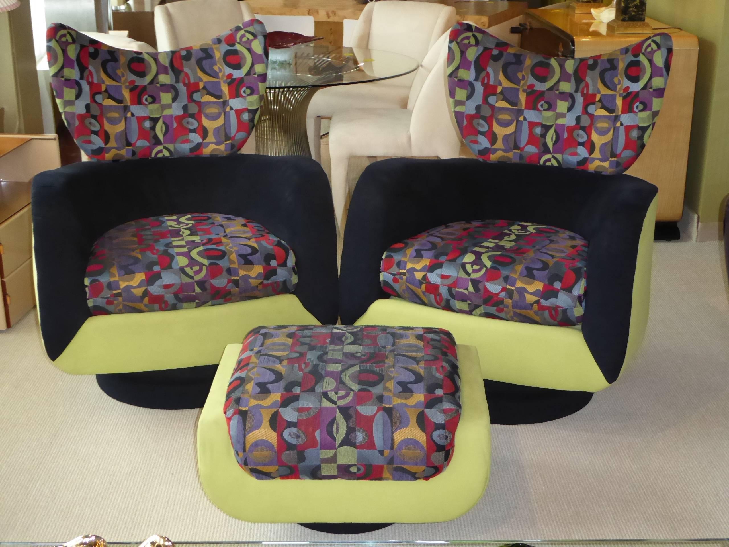 REDUCED FROM $9,500
Exceptional Kagan design for Directional, this pair of stylized wingback lounge chairs with an ottoman both swivel and rock. Sumptuously styled with enveloping curves and a large horned neck. In original fabrics, ready for