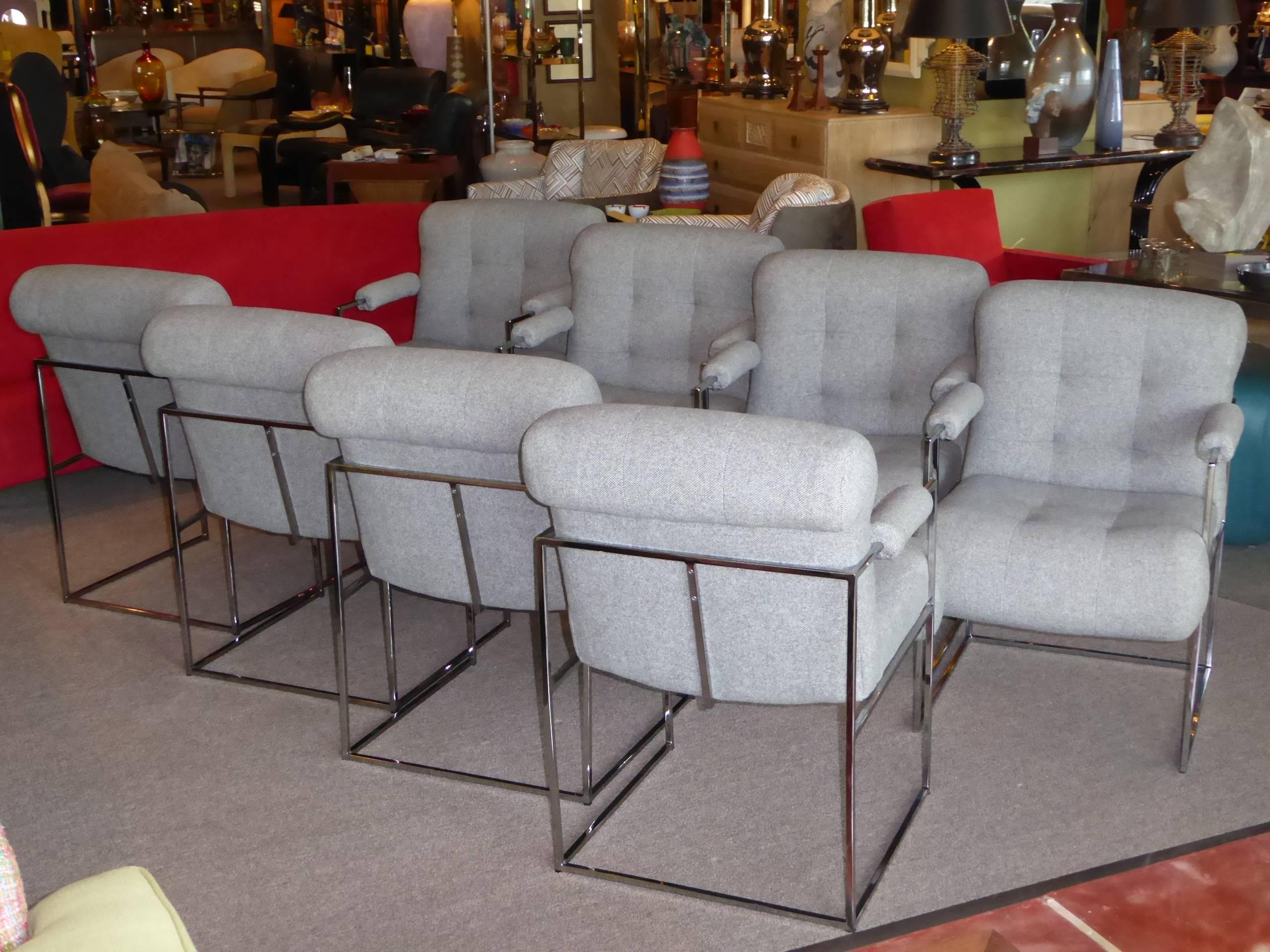 REDUCED FROM $11,000.....In their original grey tweed fabric, blind tufted and plush rolled edge upholstered seats, these eight Milo Baughman armed dining chairs are a classic delight. Excellent chrome finish tubular frames and the fabric are in