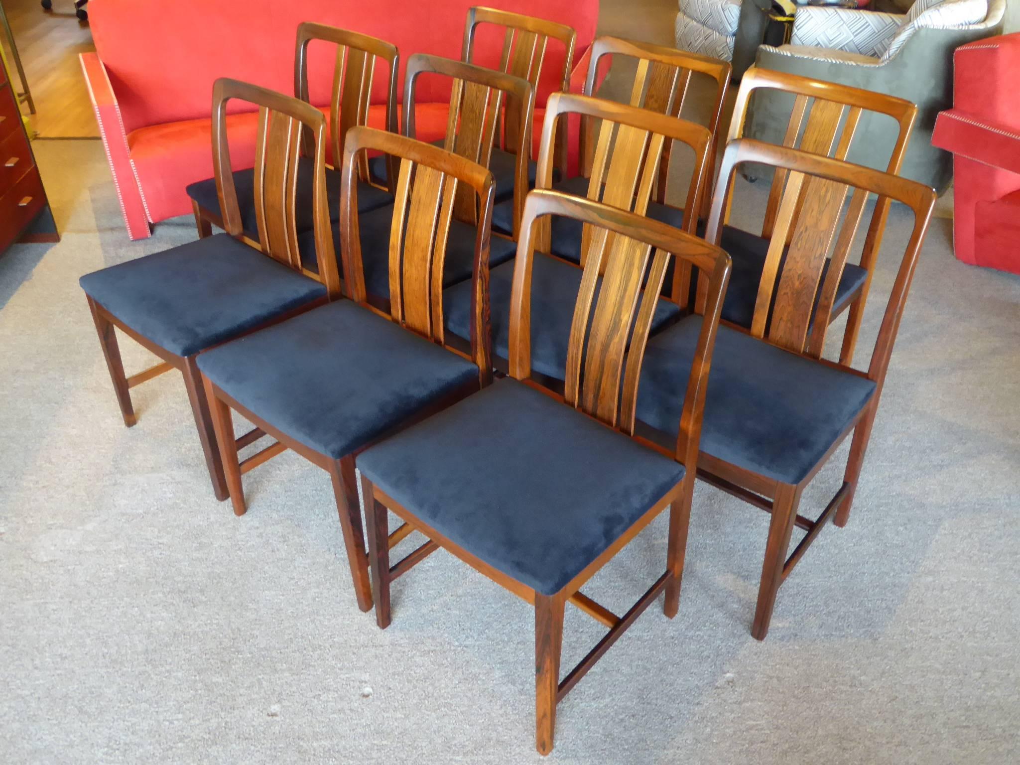REDUCED FROM $9,500....Exquisite ensemble of ten 1960s rosewood dining chairs by AB Linde Nilsson of Lammhults, Sweden. Exceptional Brazilian highly figured rosewood. High end Swedish mid century craftsmanship and beauty. Curving shaped backs, side