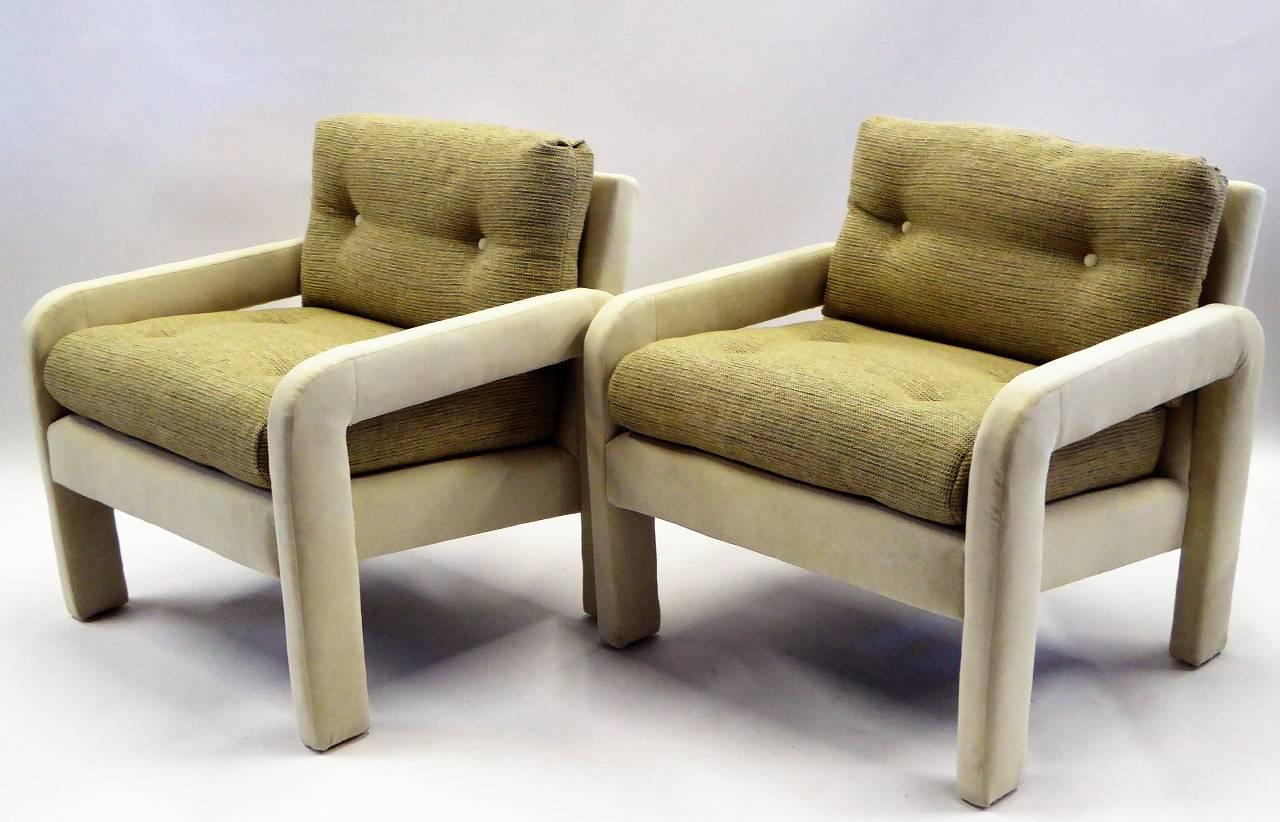 Beautifully upholstered 1970s stylized Parsons armchairs in the style of Milo Baughman with fat tufted woven fabric cushions over Microfibere's Montego cream body. Comfortable and a great scale. Neutral and plush.
Measurements: 31