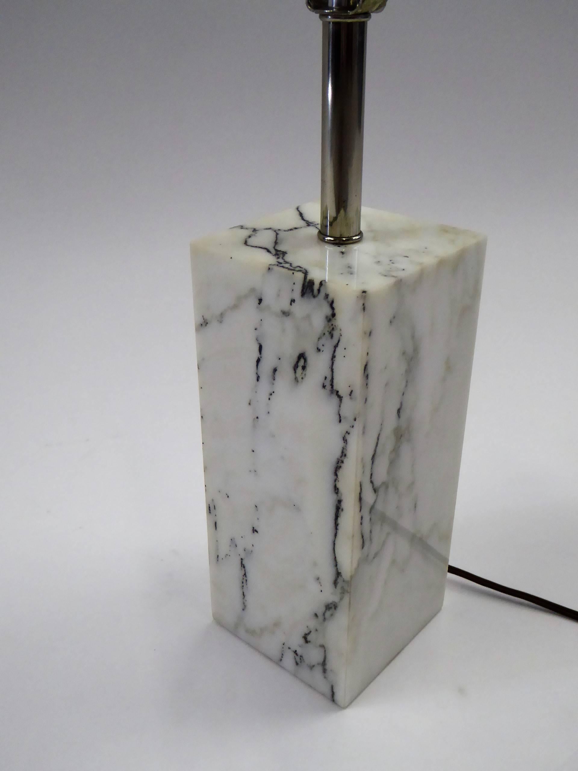 1970s marble block table lamp by Robert Sonneman in Calacatta marble with chrome stem. Made by Kovacs. Three level socket. Just add your shade.
Measurements: Marble is 9 inches high x 4 inches x 4 inches
Overall height with harp 23 inches
Bottom