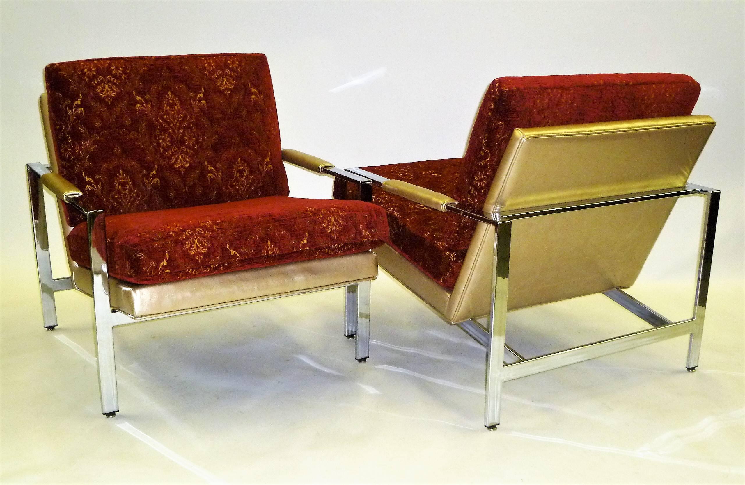 Pair of Milo Baughman's iconic lounge chairs in chrome and sumptuous original goldtone leatherette upholstery with new luxe chenille red and gold thread damask motif cushions. Created by Thayer Coggin, both retain labels. This pair in very good