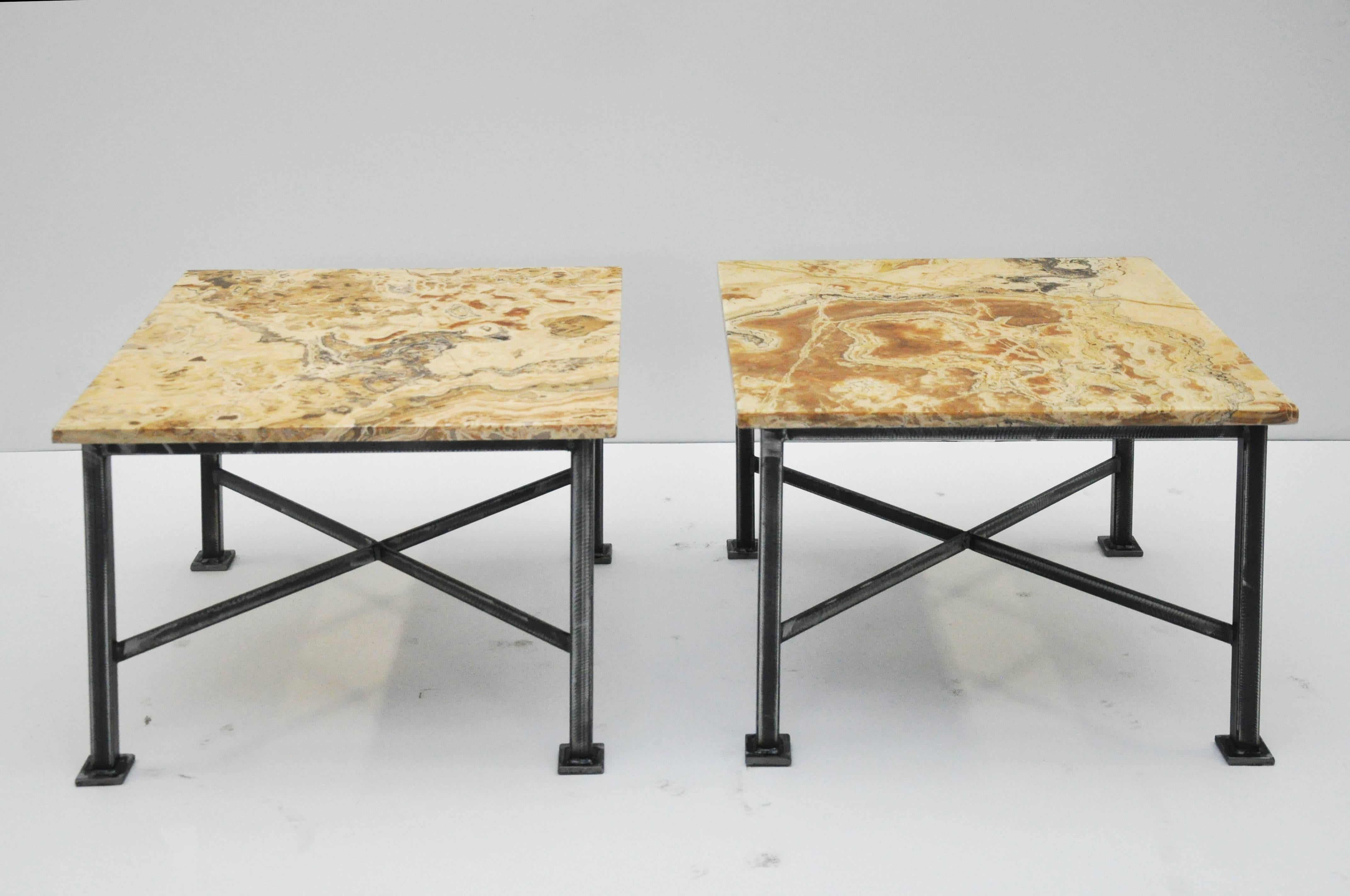 These are vintage slabs of marble that were mounted on custom iron bases. The marble has a beautiful stunning coloration. There are no marking as to where the marble originated.
