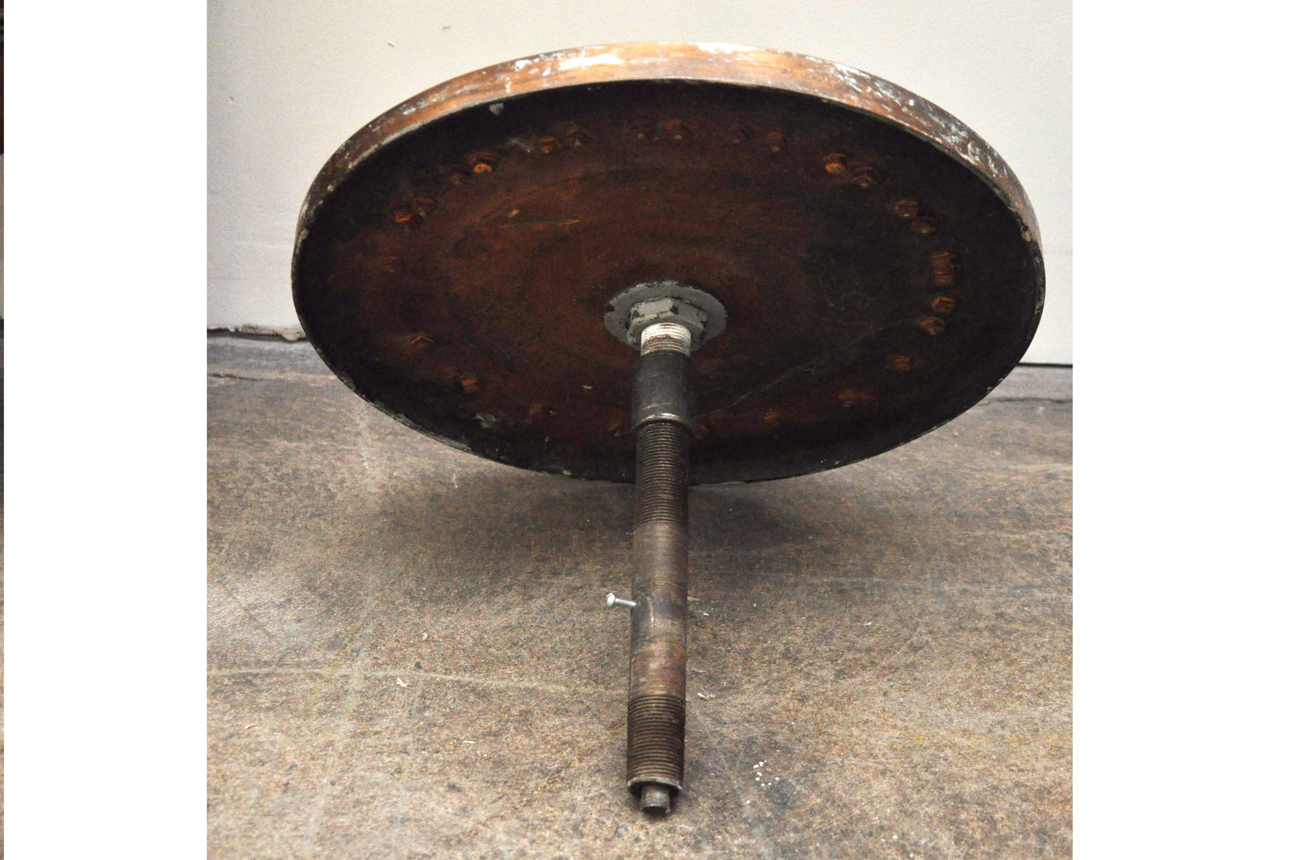 Turn of the 20th century elevator floor dial. Heavy cast metal with arrow motif hand.