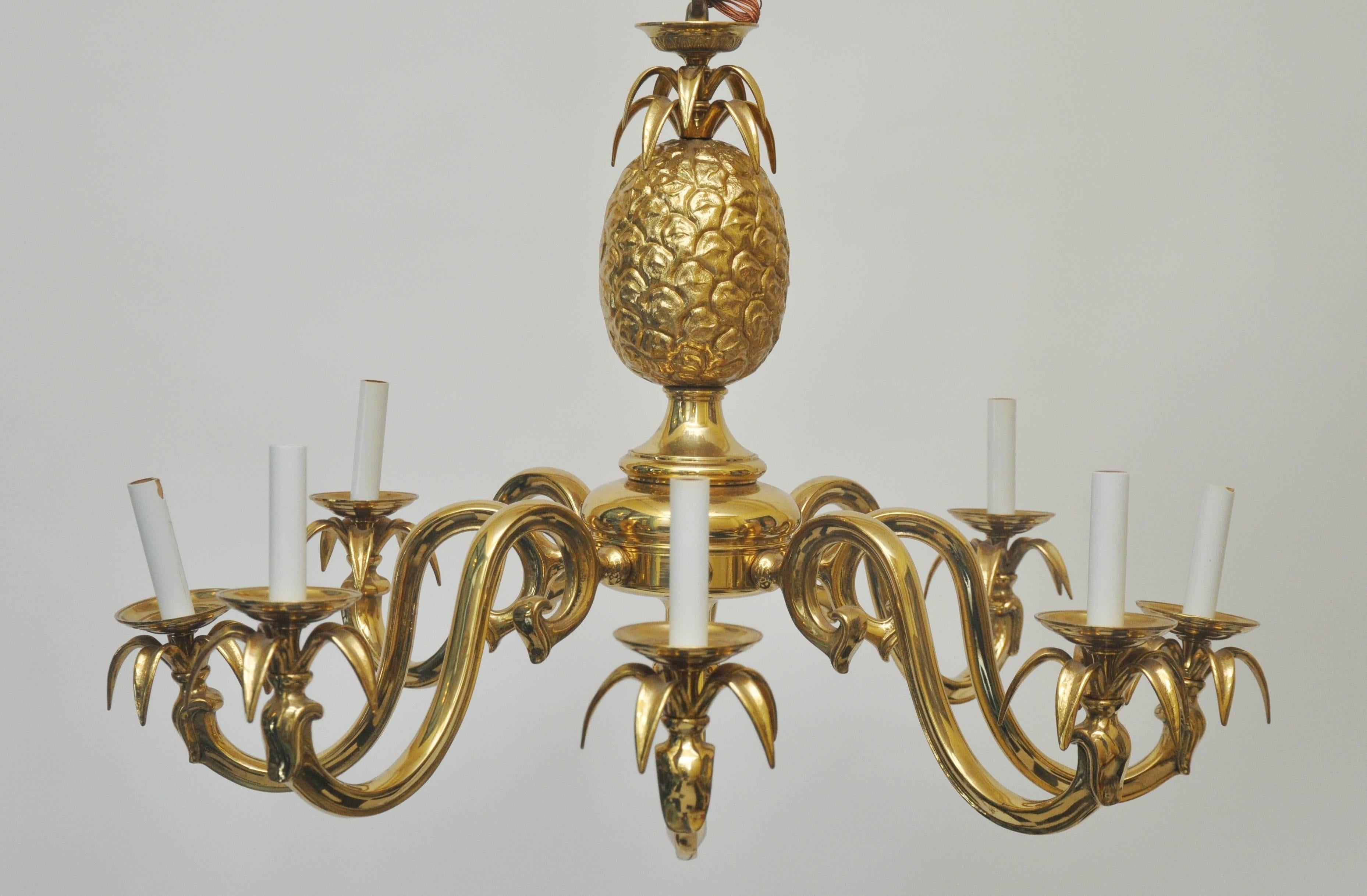 Beautiful solid brass pineapple chandelier. Made in Italy in the 1970s. Heavy brass light. Eight lights. Measures: 34" diameter also has a matching canopy and 15" of matching chain. Wired ad ready to hang.