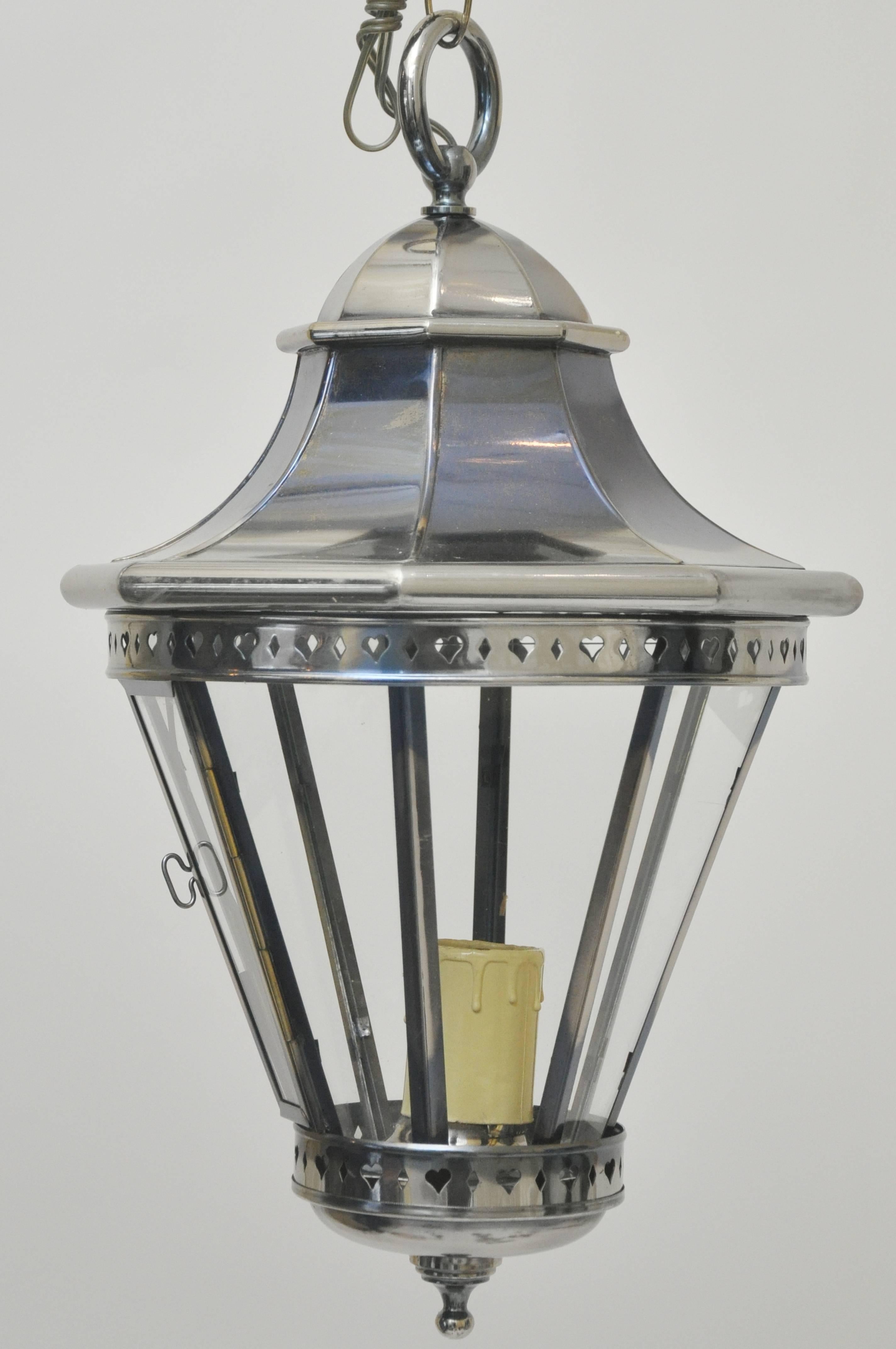 Beautifully made in Spain in the 1970s - a nickel-plated hanging pendant or lantern. Never used. The light has a single bulb socket for standard size up to 75 watts. Re-wired and ready to install. Original canopy plus 12 inches of chain. Dimensions
