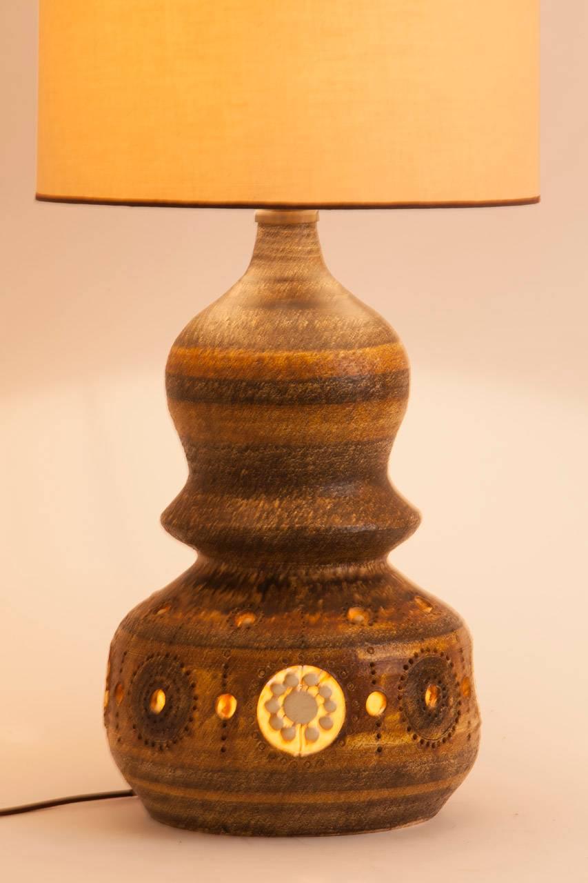 Interesting French ceramic table lamp by Georges Pelletier. Custom shade made in Paris.