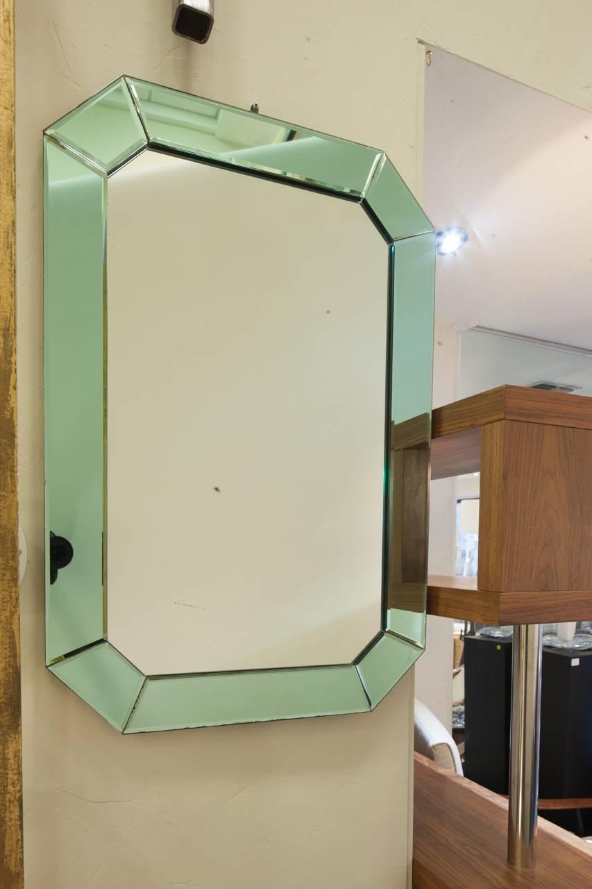 Mid-Century Venetian glass mirror with blue hued border glass. Perfect condition.