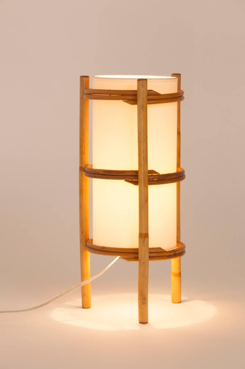 Pair of French bamboo lantern style table lamps with parchment shades.