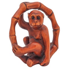 JAPAN 1880 Meiji Period Carved Wood Netsuke Of A Seated Monkey With Onyx Eyes