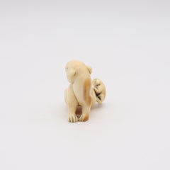 JAPAN 1885 Meiji Period Carved Netsuke Of Seated Foo-Dog With Onyx Eyes