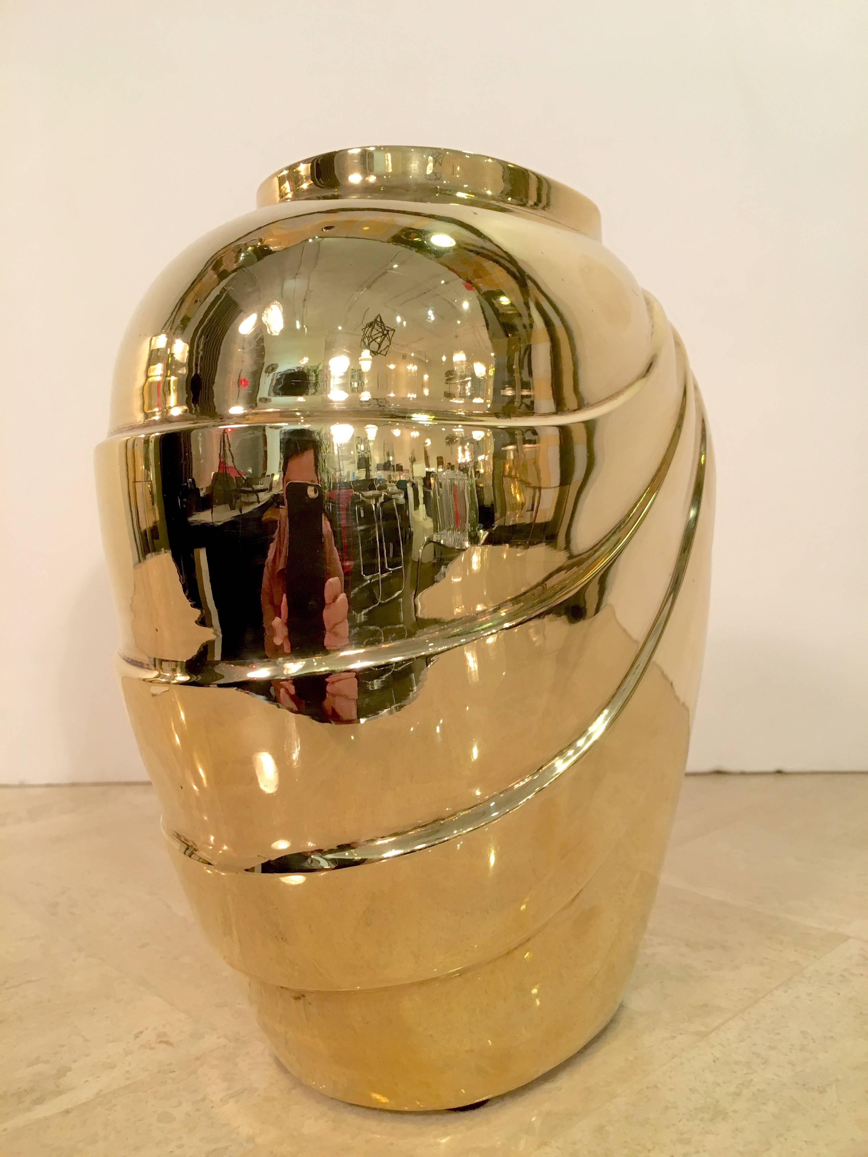 Stylish brass vase highly polished to a beautiful, brilliant shine. Please contact for location. 