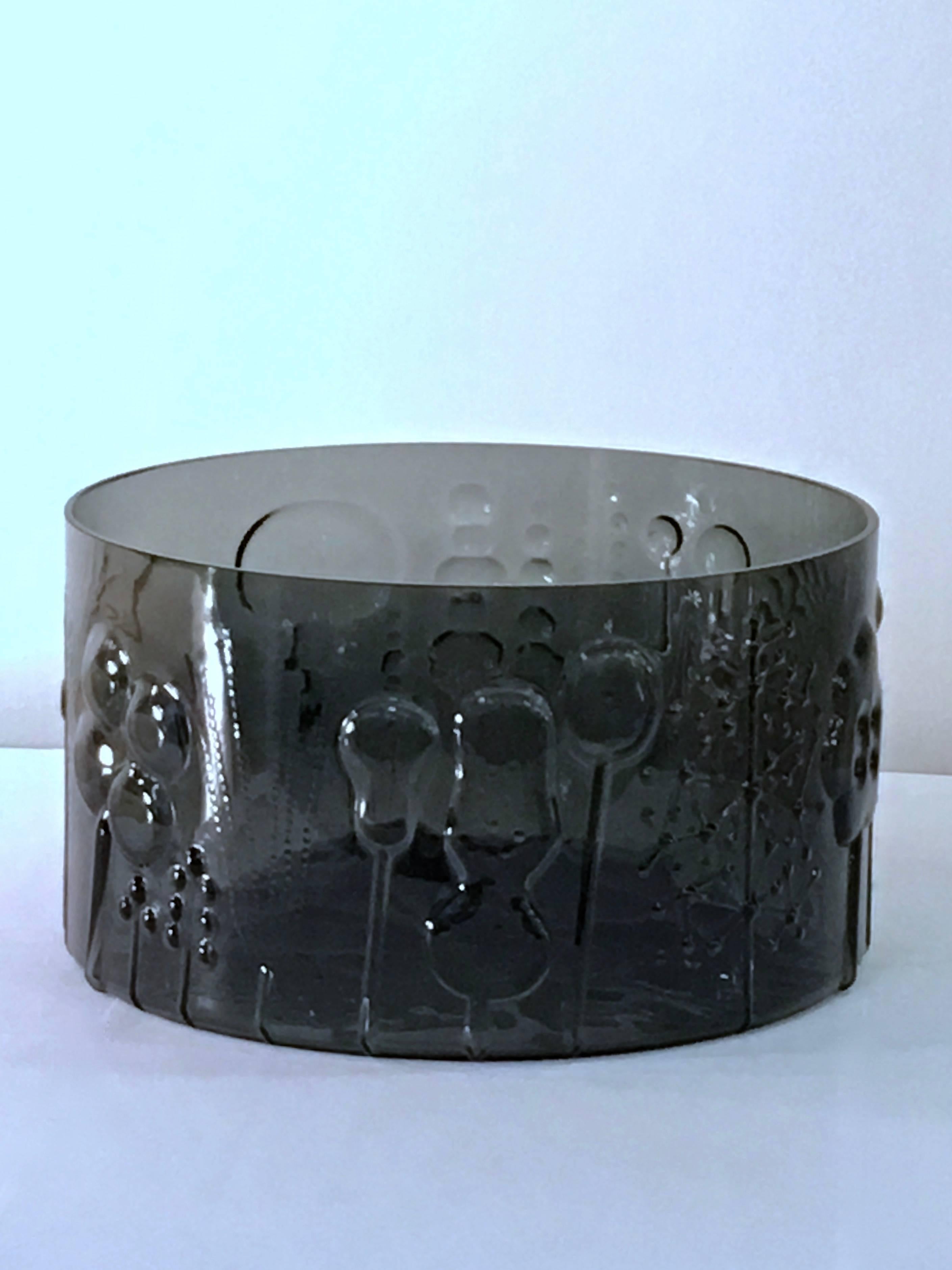 Extraordinary art glass fruit bowl or centerpiece in the Flora series by Oiva Toikka. This piece is in a rare and enchanting dark gray glass, and has a little more weight and depth to the relief than is normally found. More pieces, sizes, colors
