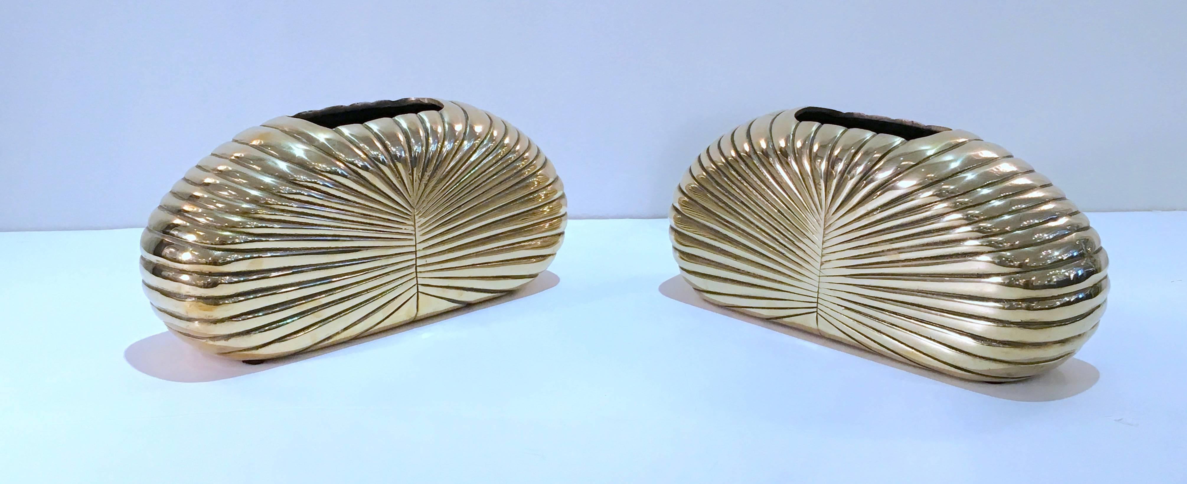 A very stylish pair of sculpted vases in a gleaming polished solid brass. These are rare and are the largest size in this design series by Dolbi Cashier. Very chic! Please contact for location. 