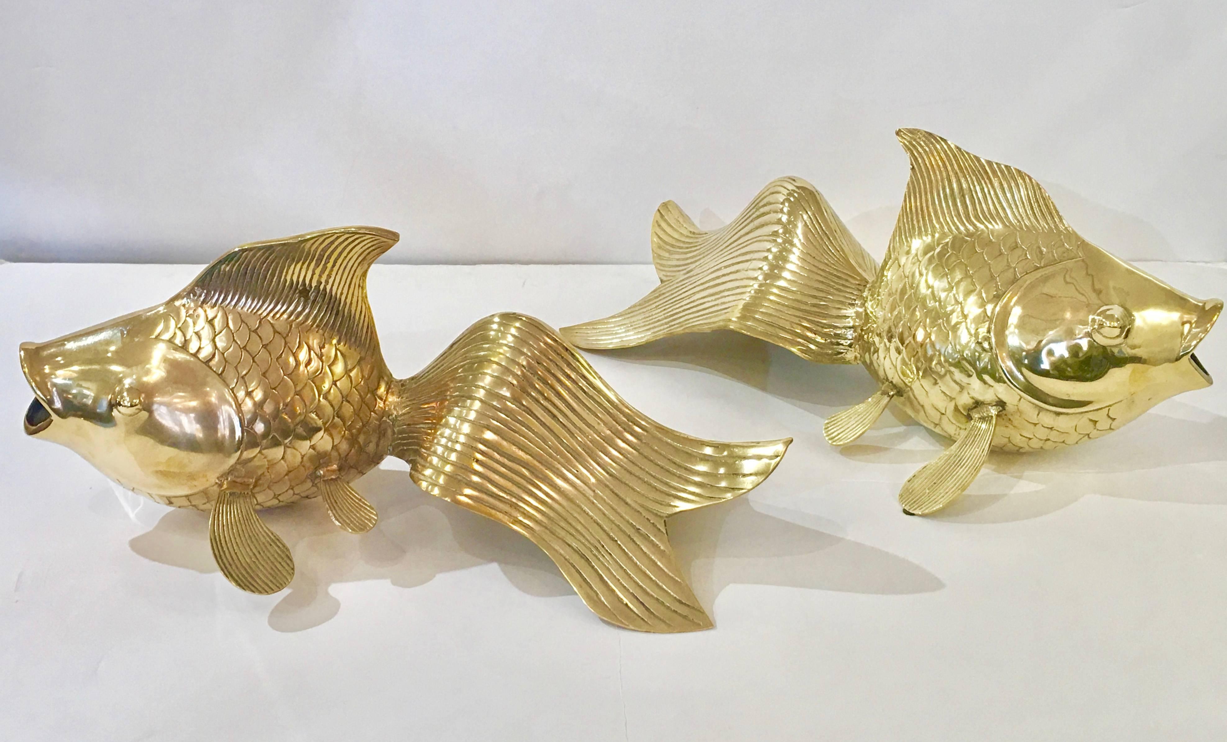 Extraordinary pair of sculptural brass koi, or gold fish by Rosenthal. This is a rare pair. The scale is monumental. Magnificent! Please contact for location. Offered by Las Venus by Kenneth Clark, New York City.