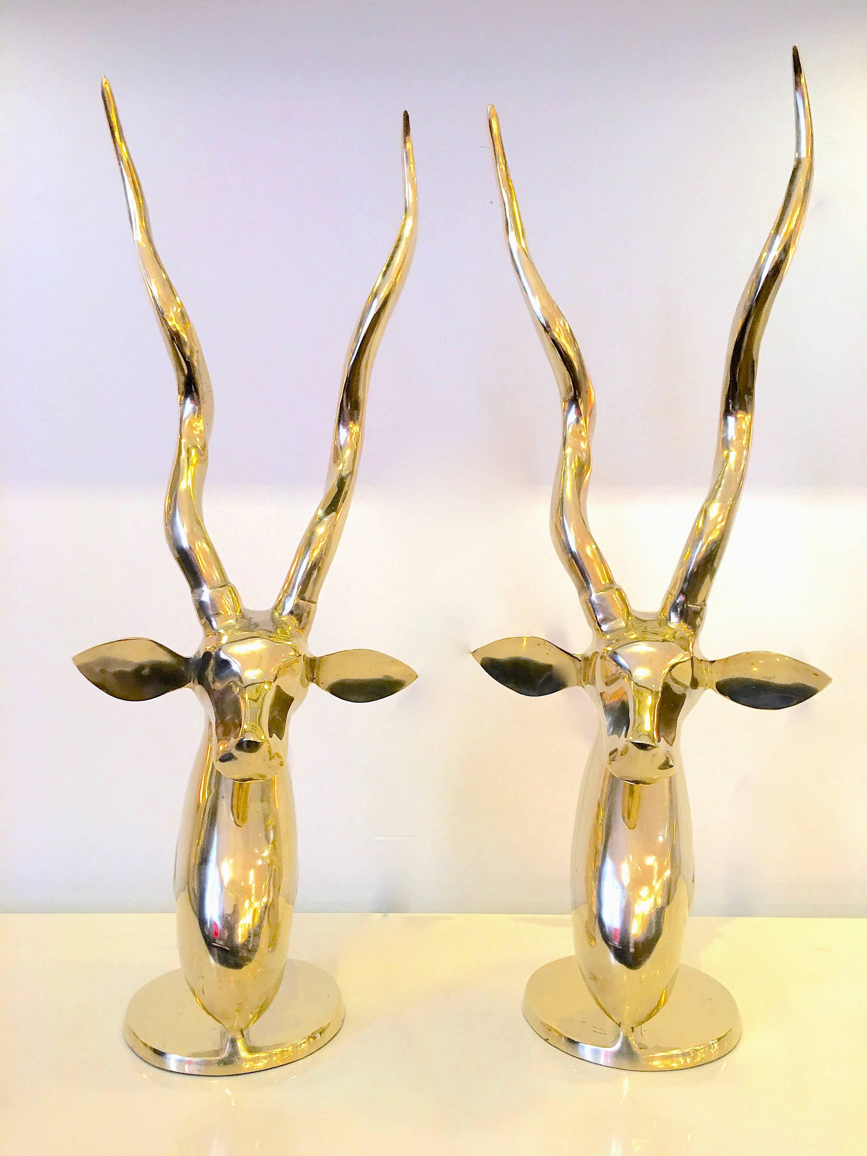 Impressive pair of gazelles finished in a gleaming polished brass. Fantastic accent pieces! Please contact for location. 