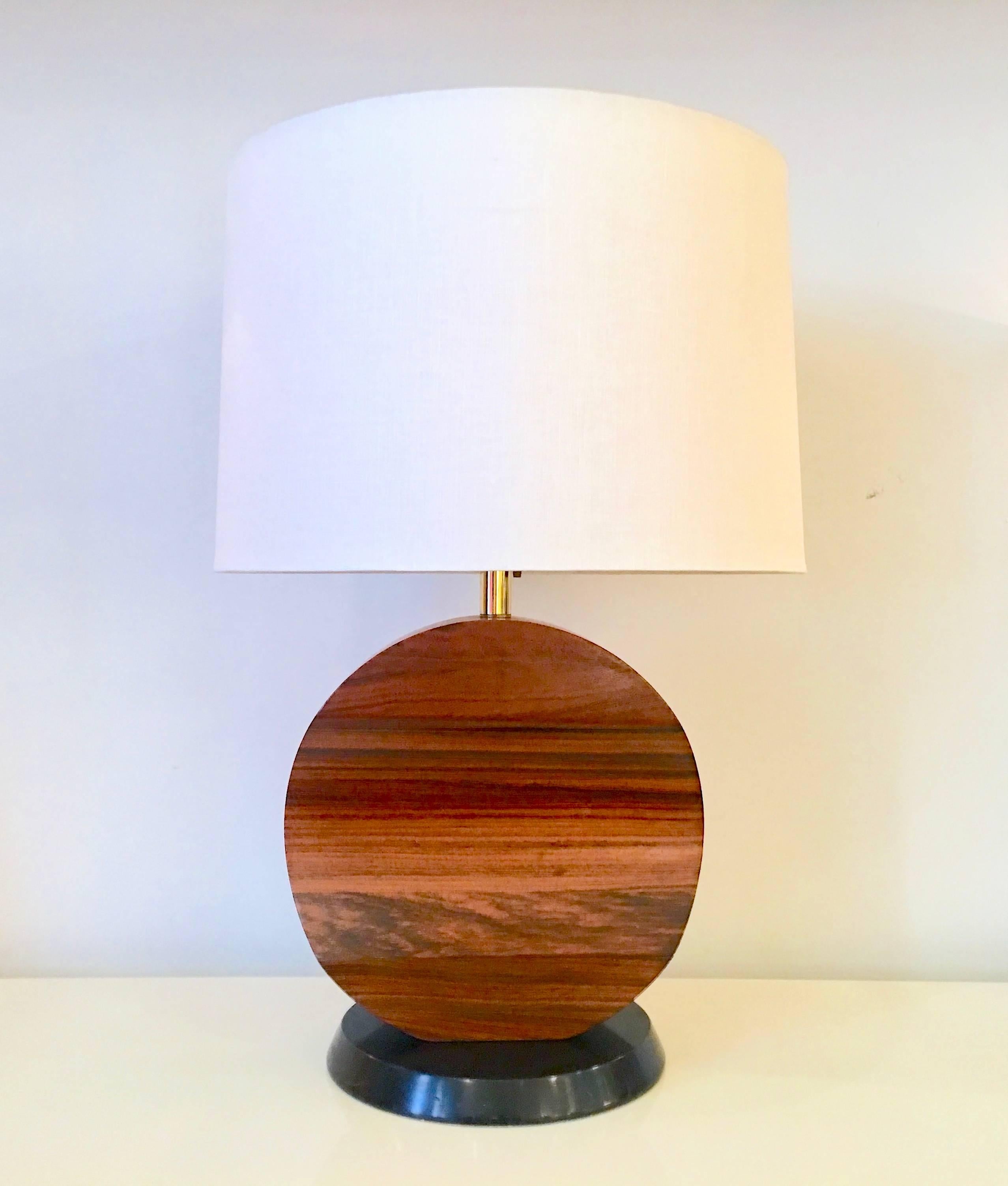 A striking pair of boldly sculpted lamps in beautiful solid rosewood.
