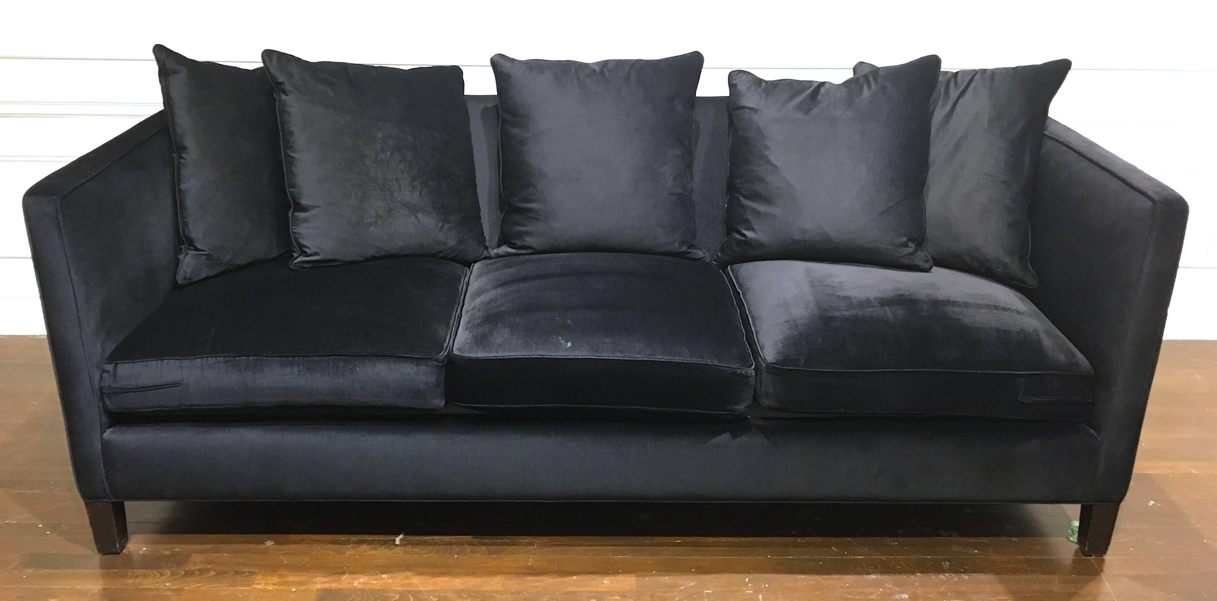 Handsome and plush shelter sofa shown in a beautiful black velvet. Please contact for location. 