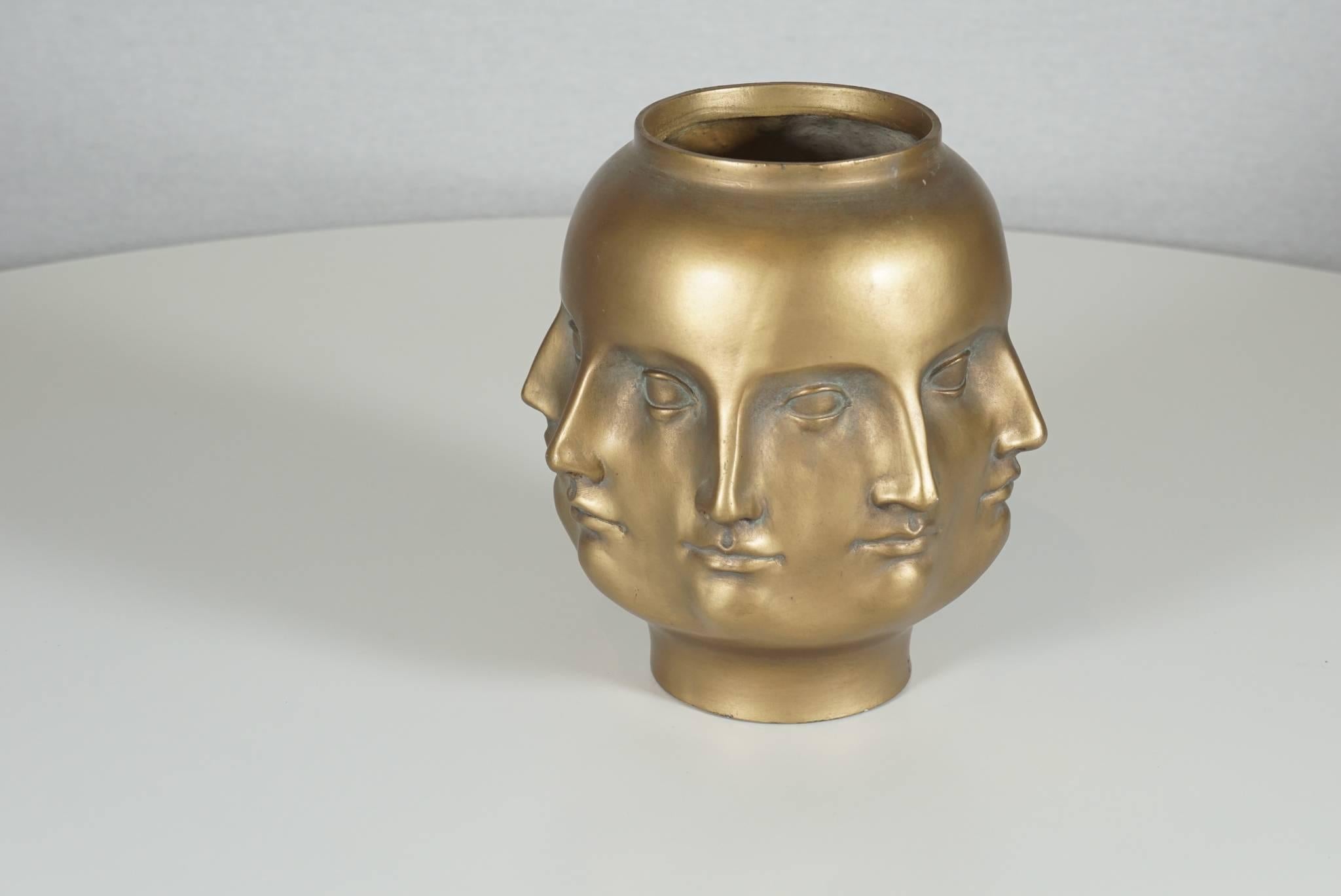 Here is a great Dora Maar perpetual vase in a gold finish. The vase is made of resin. In the style of Fornasetti, the vase is also based on Picasso's portraits of Dora Maar.