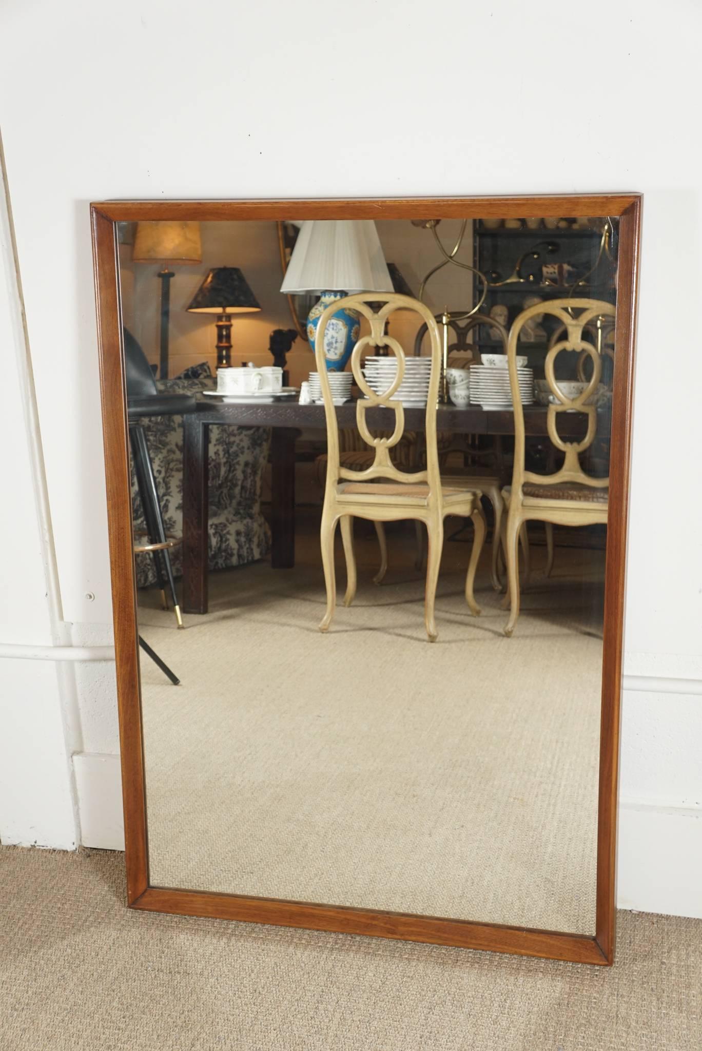 Here is a great modern rectangular mirror with an inset border in solid walnut.