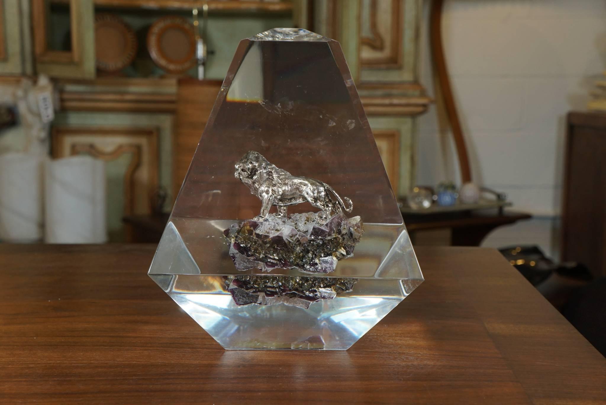 Here is an amazing lucite obelisk sculpture with an encased silver lion standing on an amethyst specimen. Thoroughly modern, this piece is in the style of Allesandro Albrezzi and Pierre Geuridon.