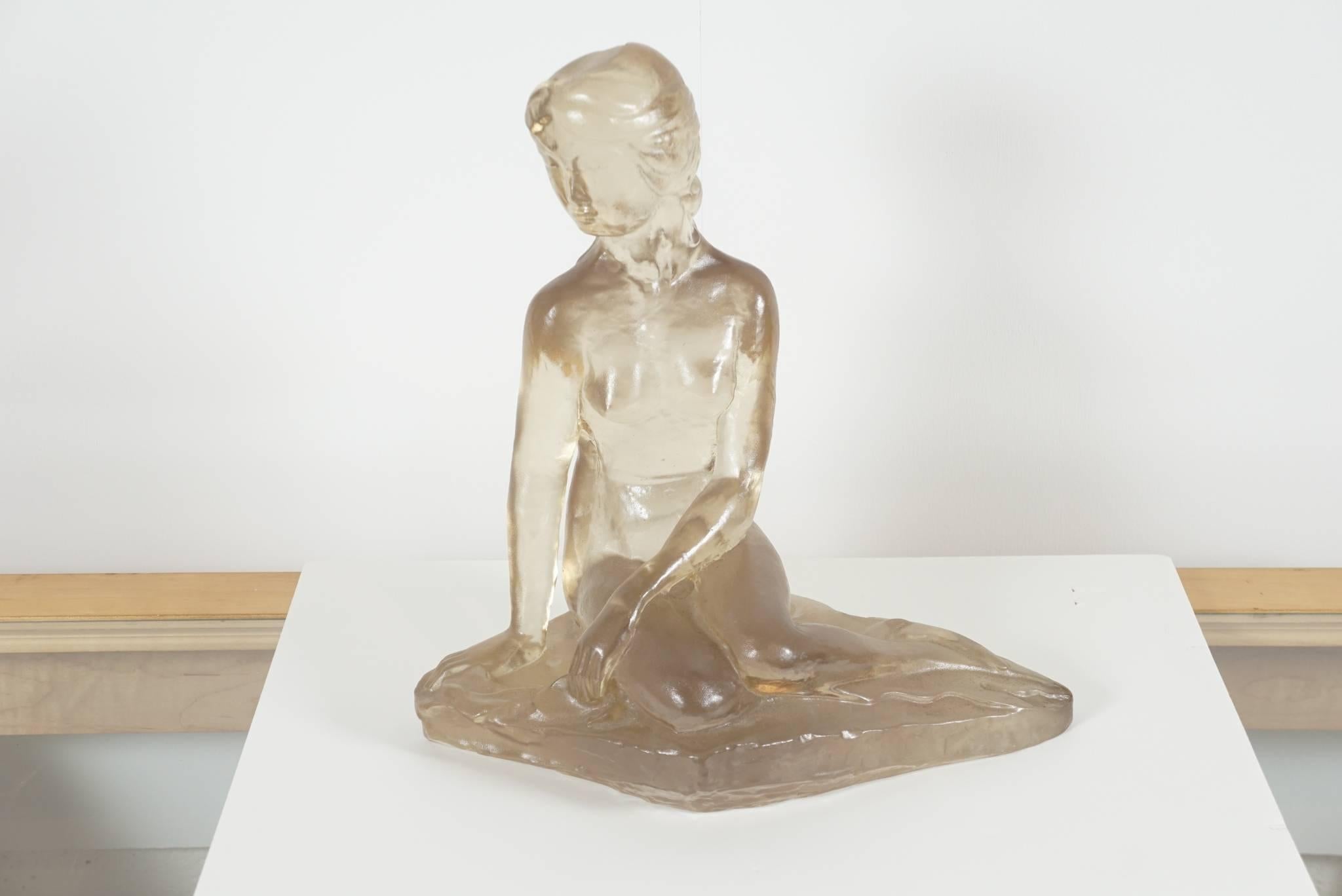 Here is a great seated nude female figure in cast resin by Dorothy Thorpe.