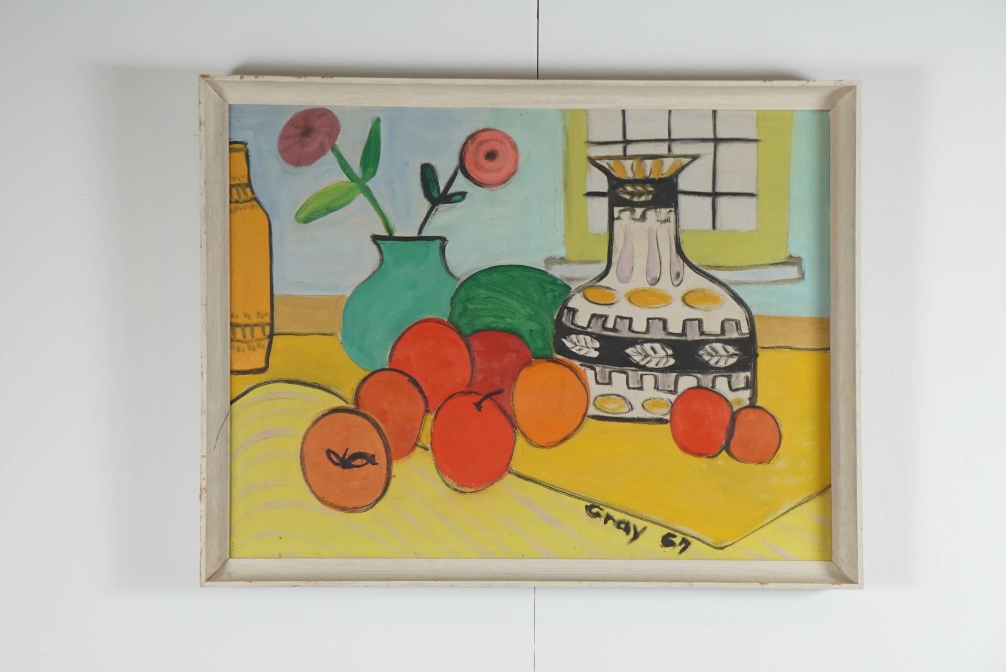 Here is a cheerful and brightly colored modern still life painting with oranges and vases and flowers. Signed and dated Gray 1967. Framed in a painted wooden frame with slight vintage distressing.