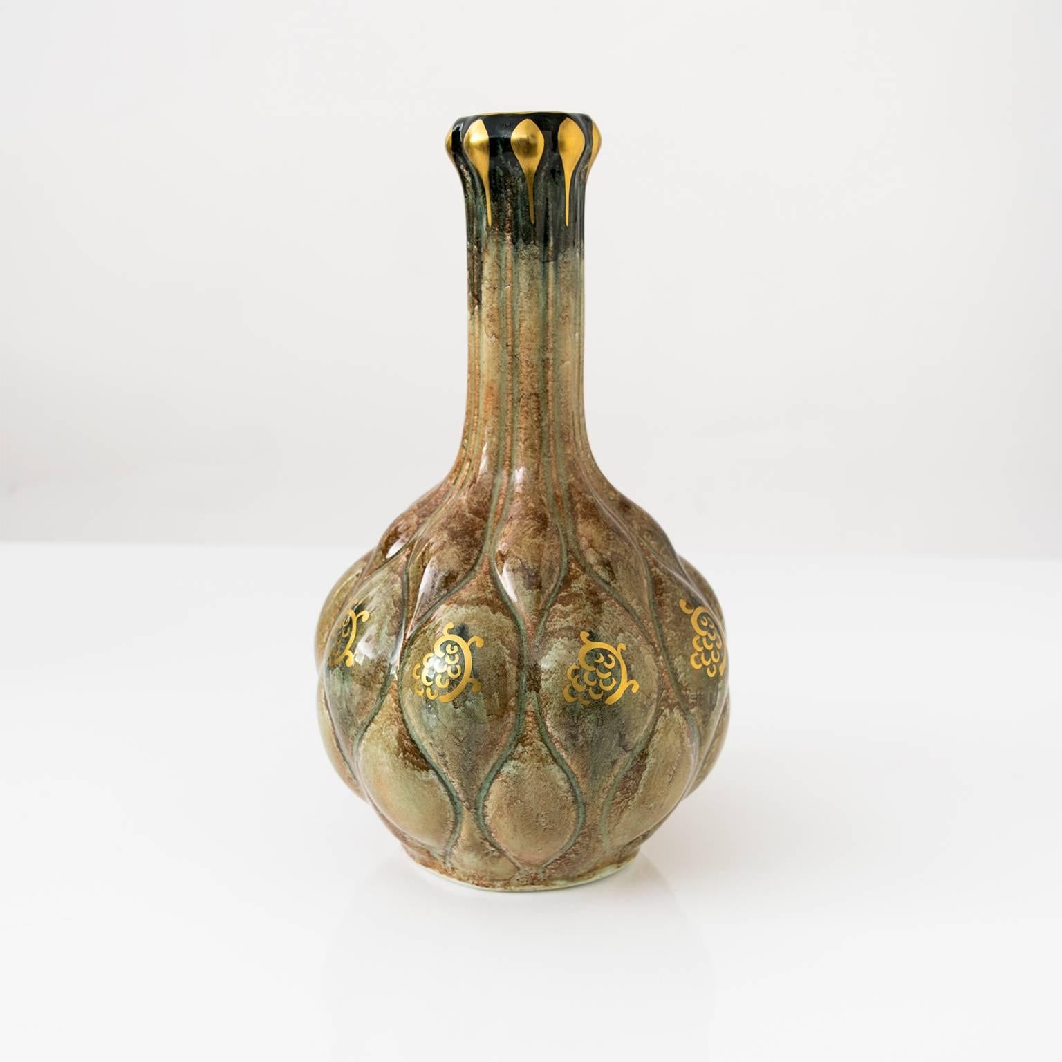 Scandinavian Modern Swedish Art Deco luster glazed bottle vase decorated with gold details, designed by Josef Ekberg for Gustavsberg, signed and dated 1931.

Measures: H. 10.25