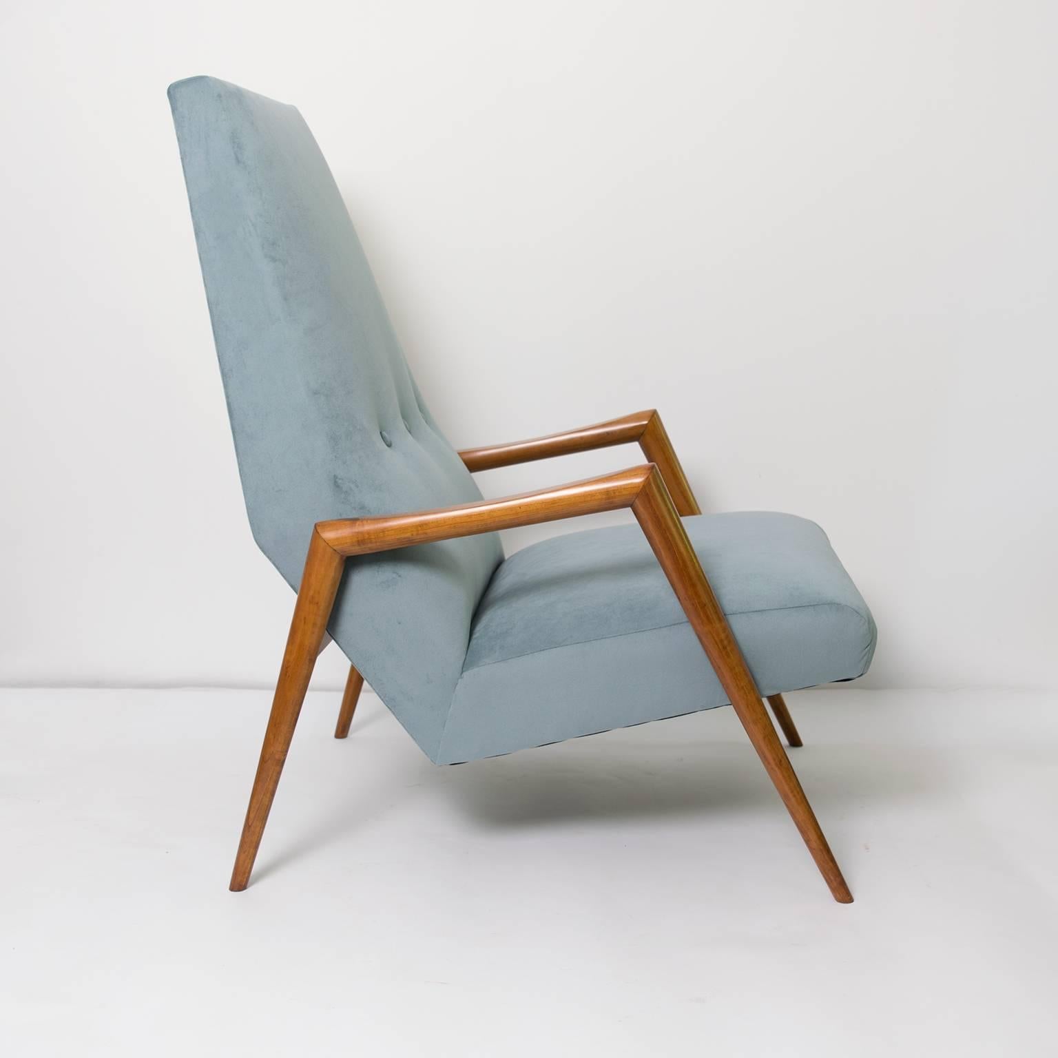A Scandinavian modern high back carved fruit wood lounge chair, newly restored and upholstered in pale blue velvet fabric. 
 
Measures: Height 38.5", width 26", depth 33", Seat height 17".