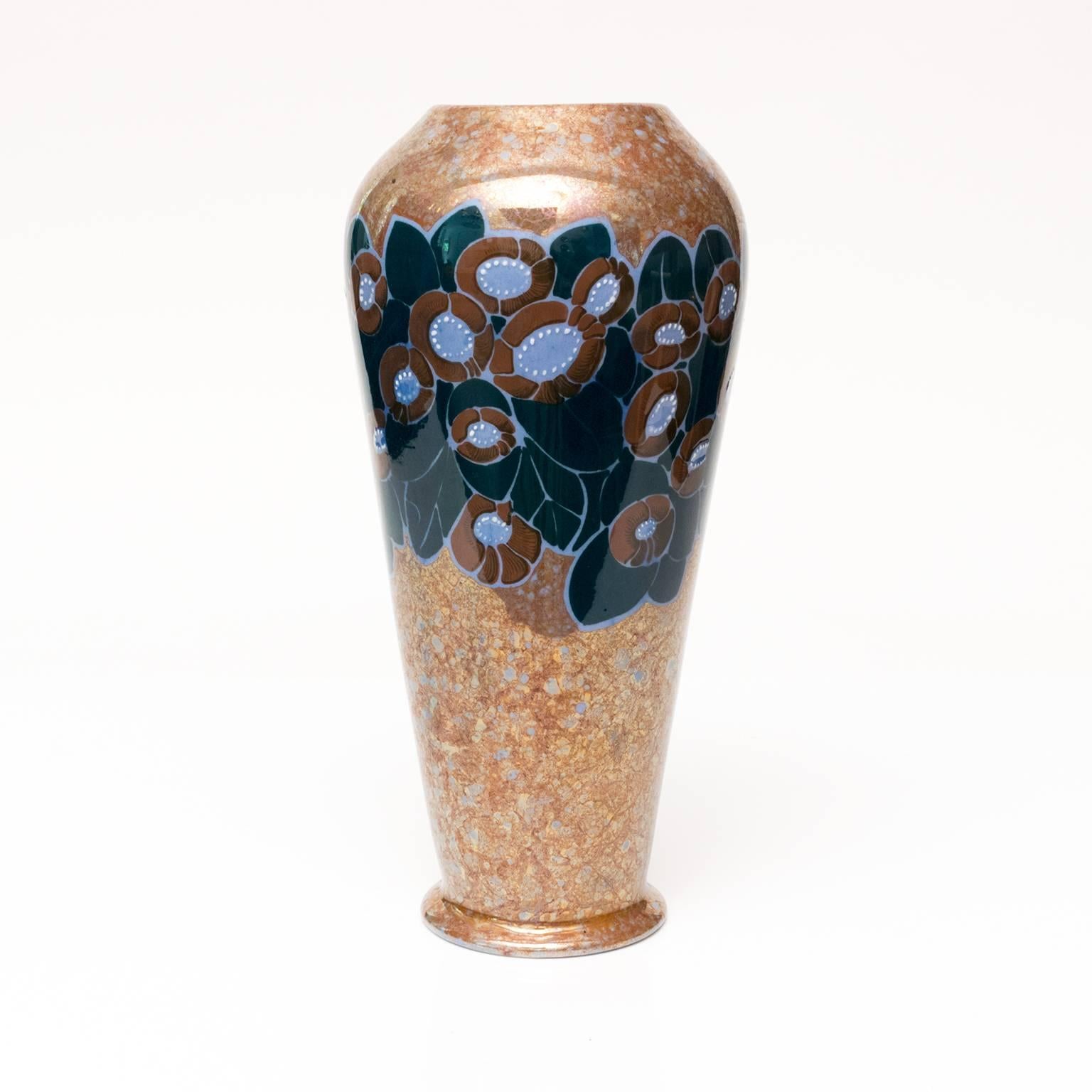 Large Scandinavian modern luster glazed ceramic vase with floral motif on a marbleized ground. Made by Arabia Oy, Helsinki, Finland. Designed by Thure Öberg, signed on bottom 