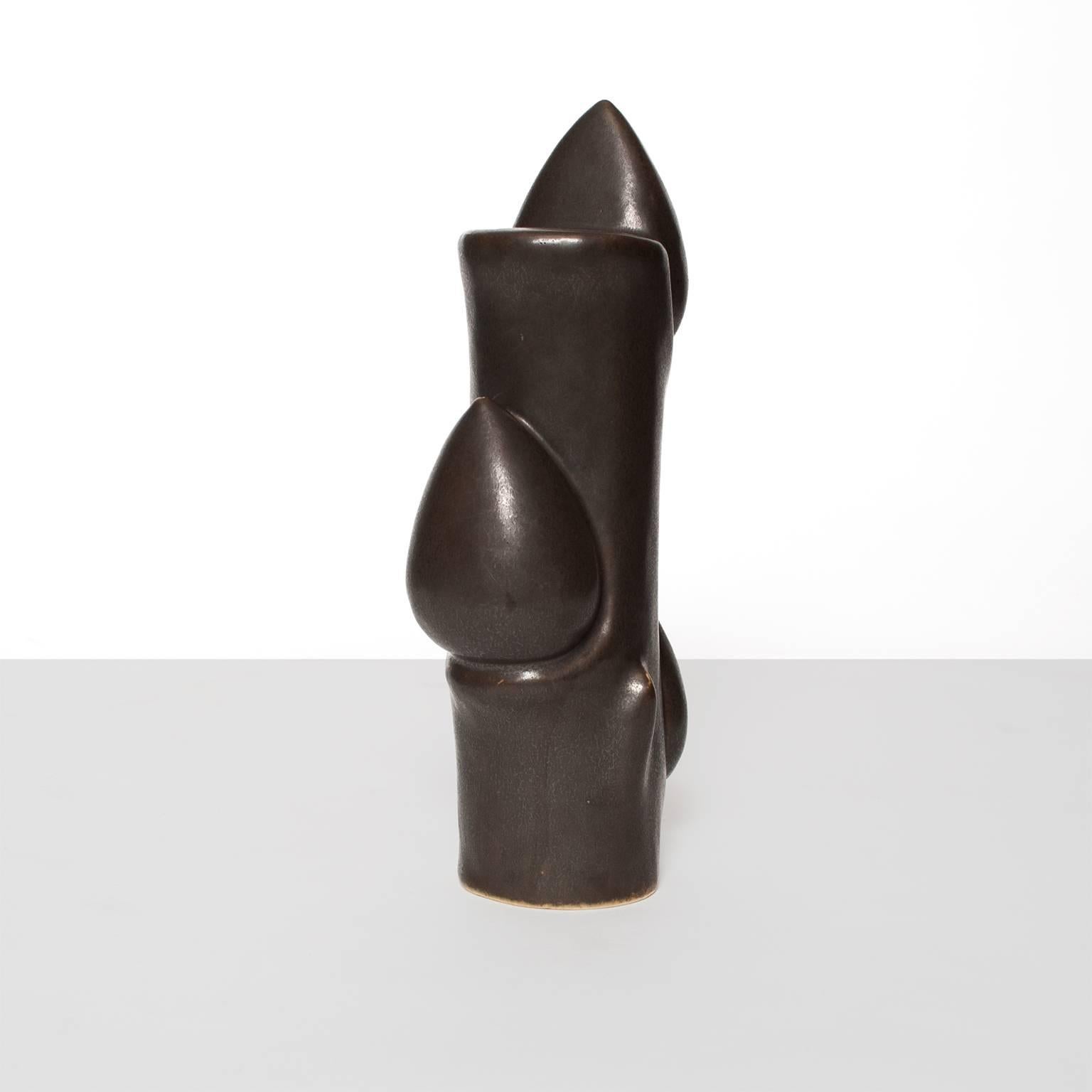 A Danish Mid-Century Modern ceramic vase by Knud Basse for Michael Andersen & Sons. This 
