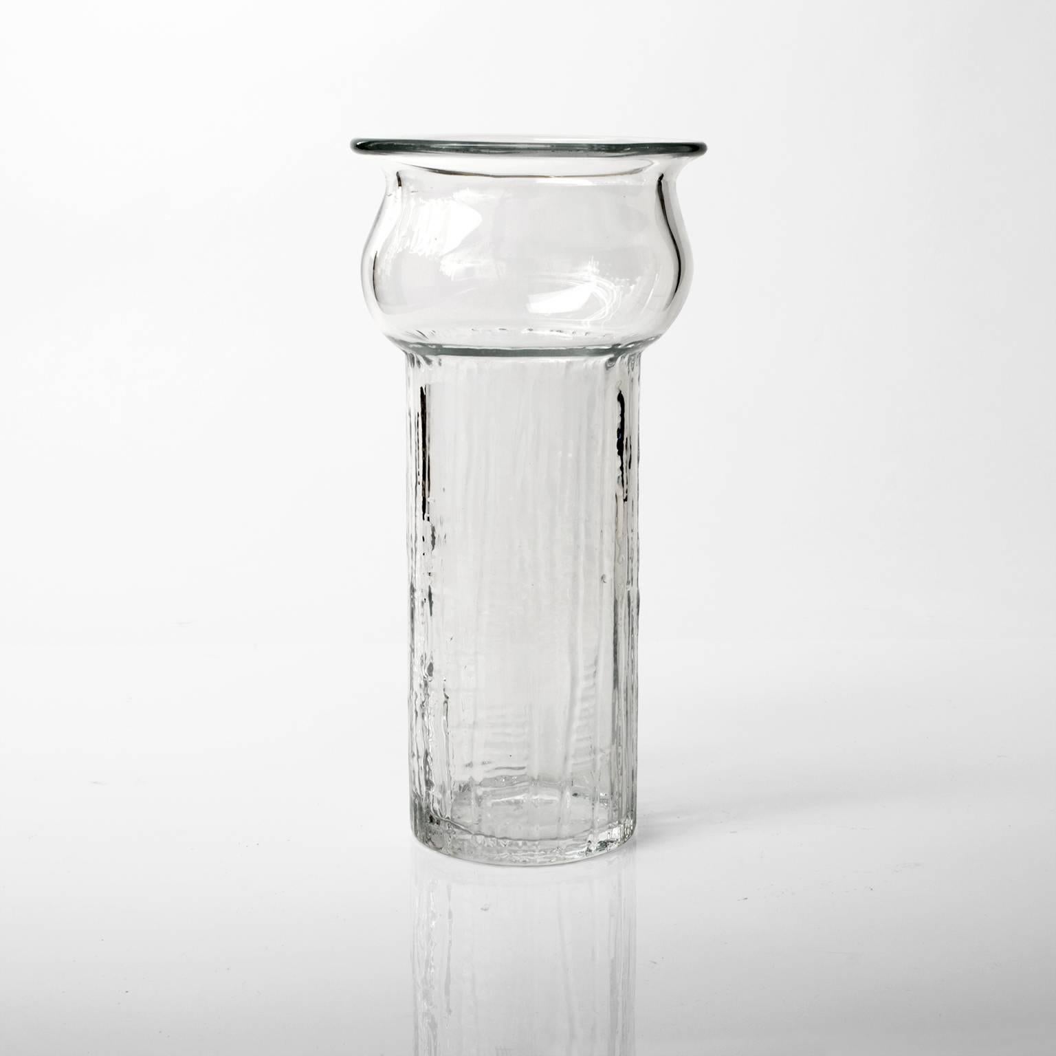 Scandinavian Modern Swedish Mid-Century tall clear glass vase with textured body made by Pukeberg, circa 1960s.

Measures: H 12.5