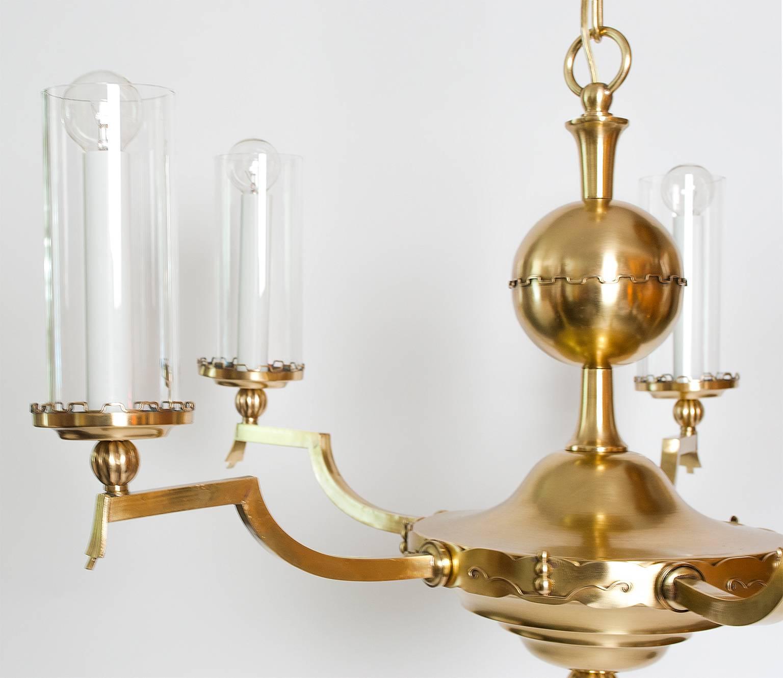 Scandinavian Modern Five-Arm Brass Chandelier with Cylindrical Glass Shades In Excellent Condition For Sale In New York, NY