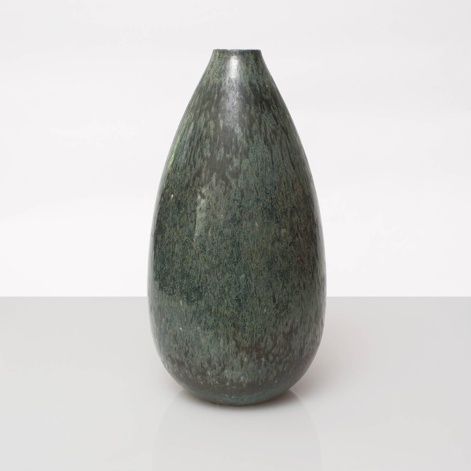 Large Scandinavian Modern studio vase in a richly mottled  green glaze. Designed by Gunnar Nylund for Rorstrand, signed on bottom. 
Height: 15.5
Diameter: 7.5
