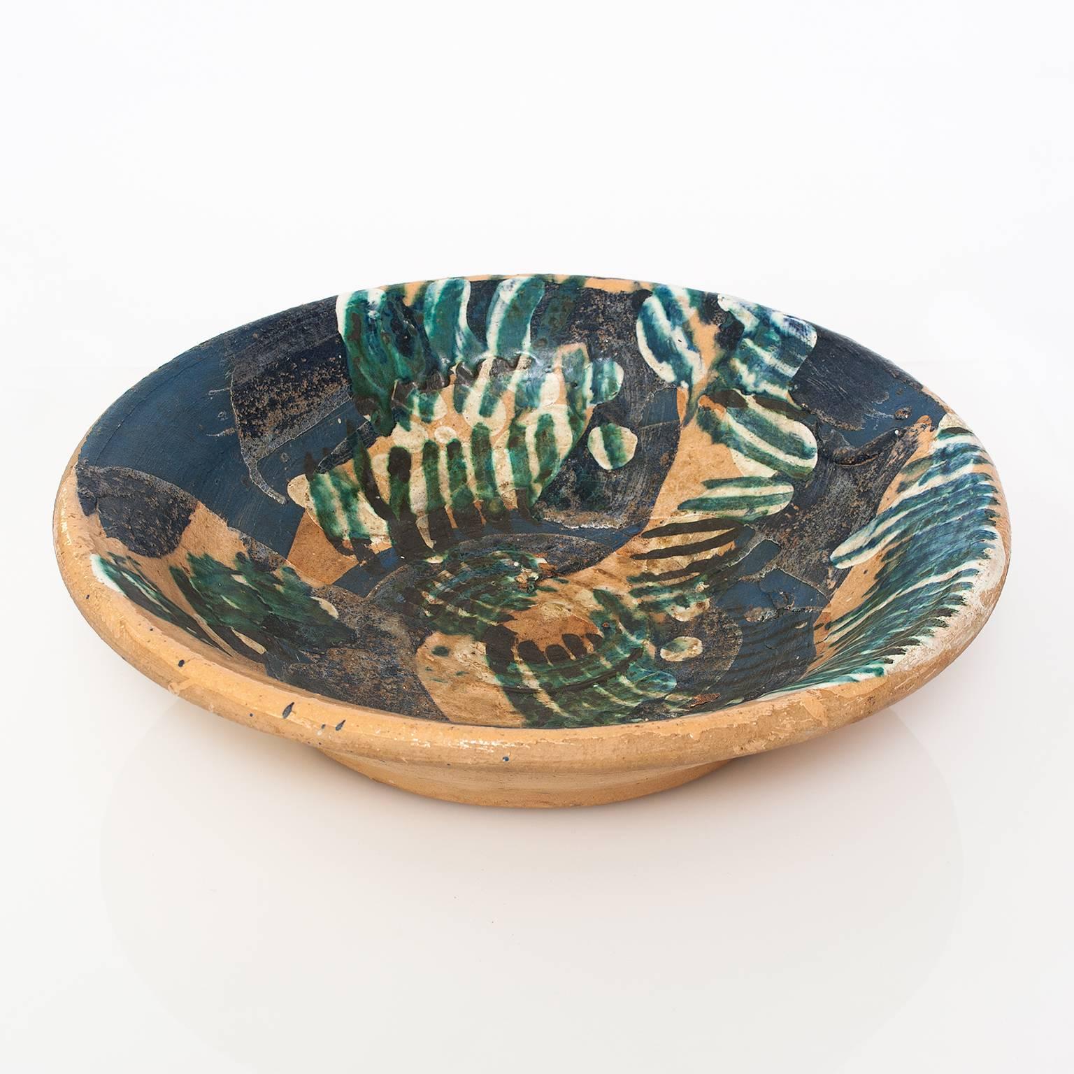Scandinavian Modern unique hand built and decorated earthenware bowl by artist Hertha Hilton. Signed and dated on the bottom 1971. 

The Liljevalchs Museum in Stockholm, Sweden honored Hertha Hillfon (1921-2013) in the summer of 2015 with a museum