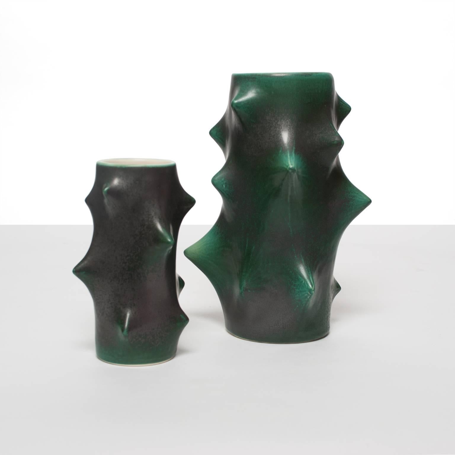 One large and one smaller Scandinavian Modern ceramic vases by Knud Basse for Michael Andersen & Sons. These 