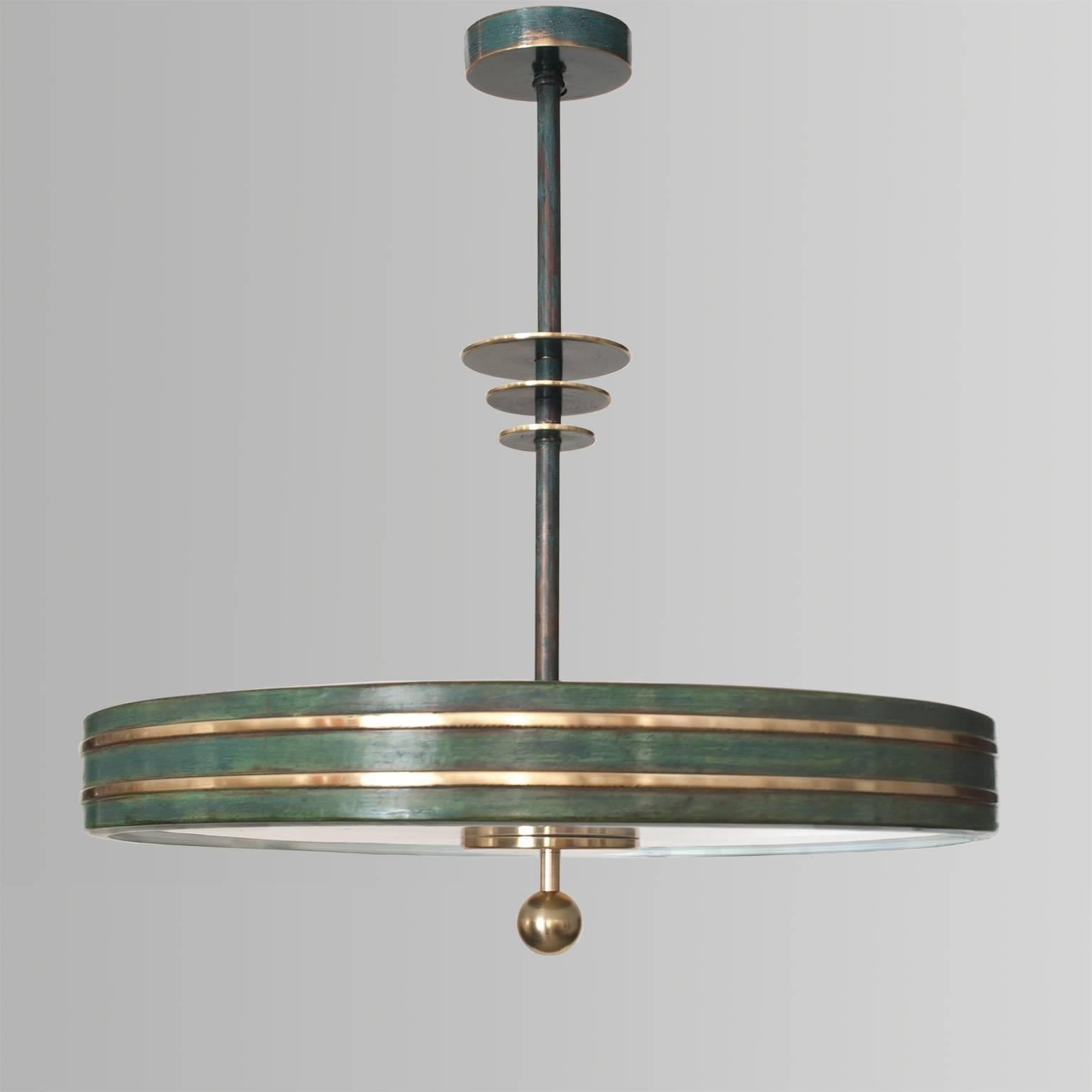 Patinated Scandinavian Modern patinated and polished brass pendant from Bohlmarks